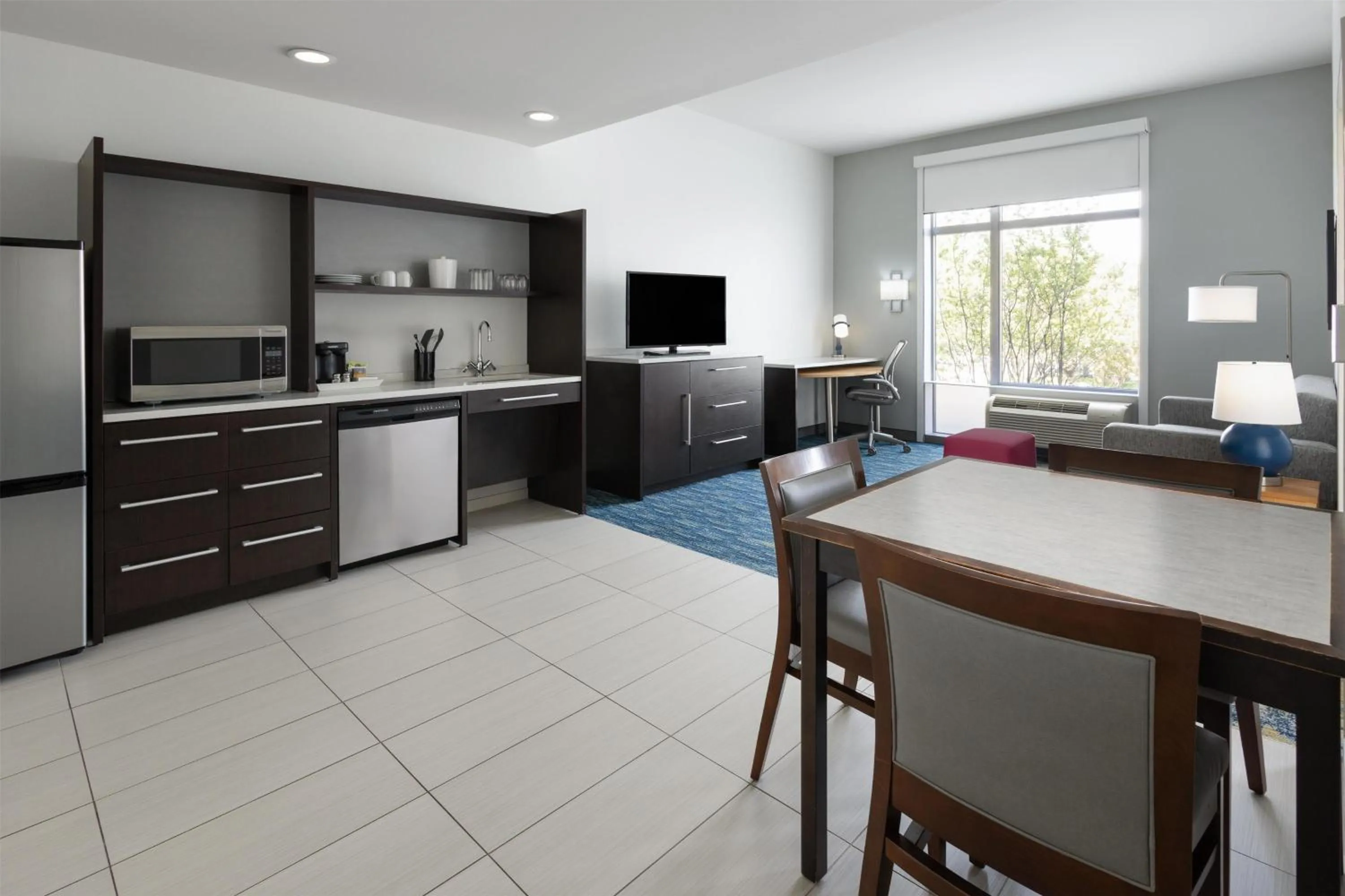 Living room in Home2 Suites by Hilton Greenville Downtown