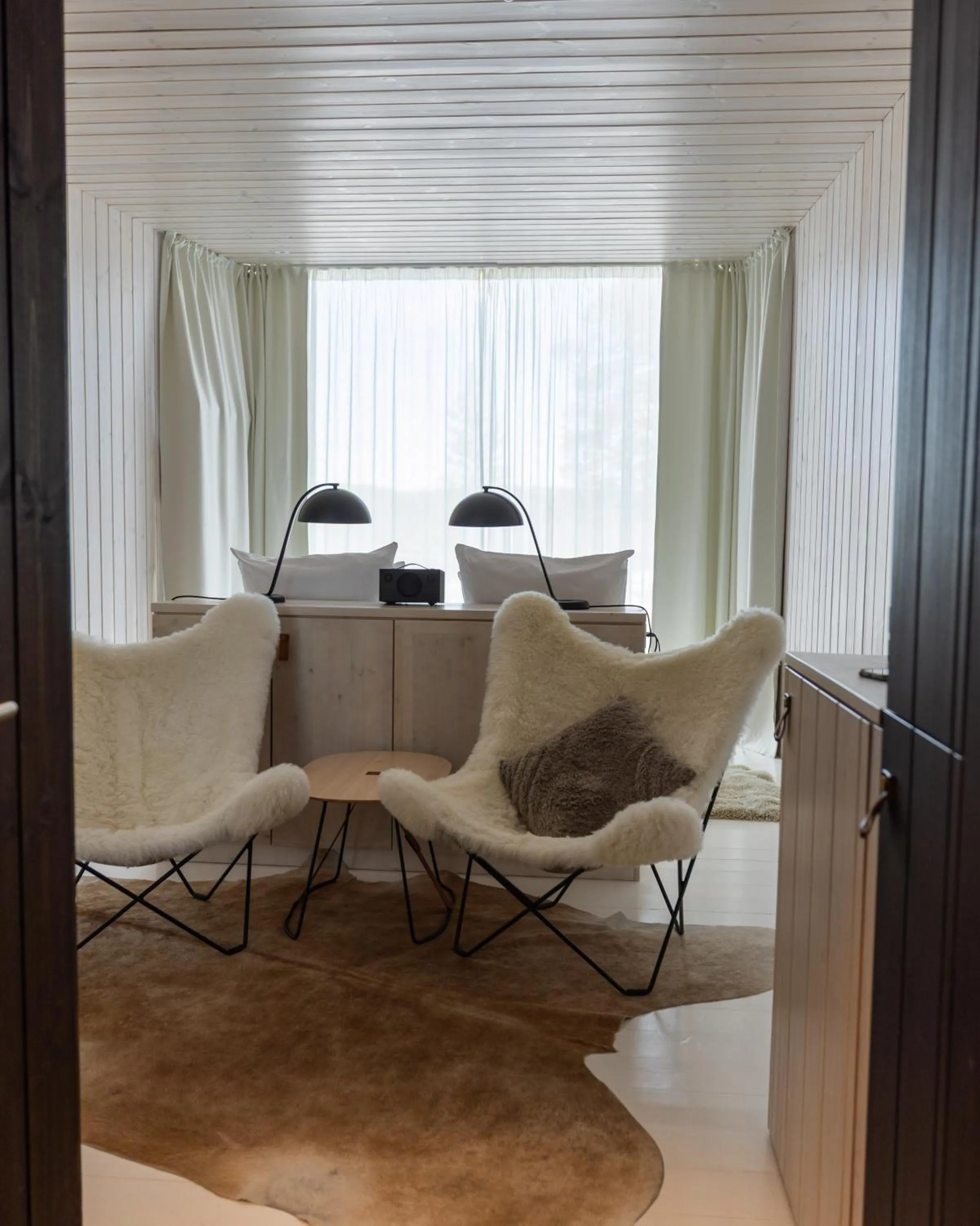 Communal lounge/ TV room in Arctic TreeHouse Hotel