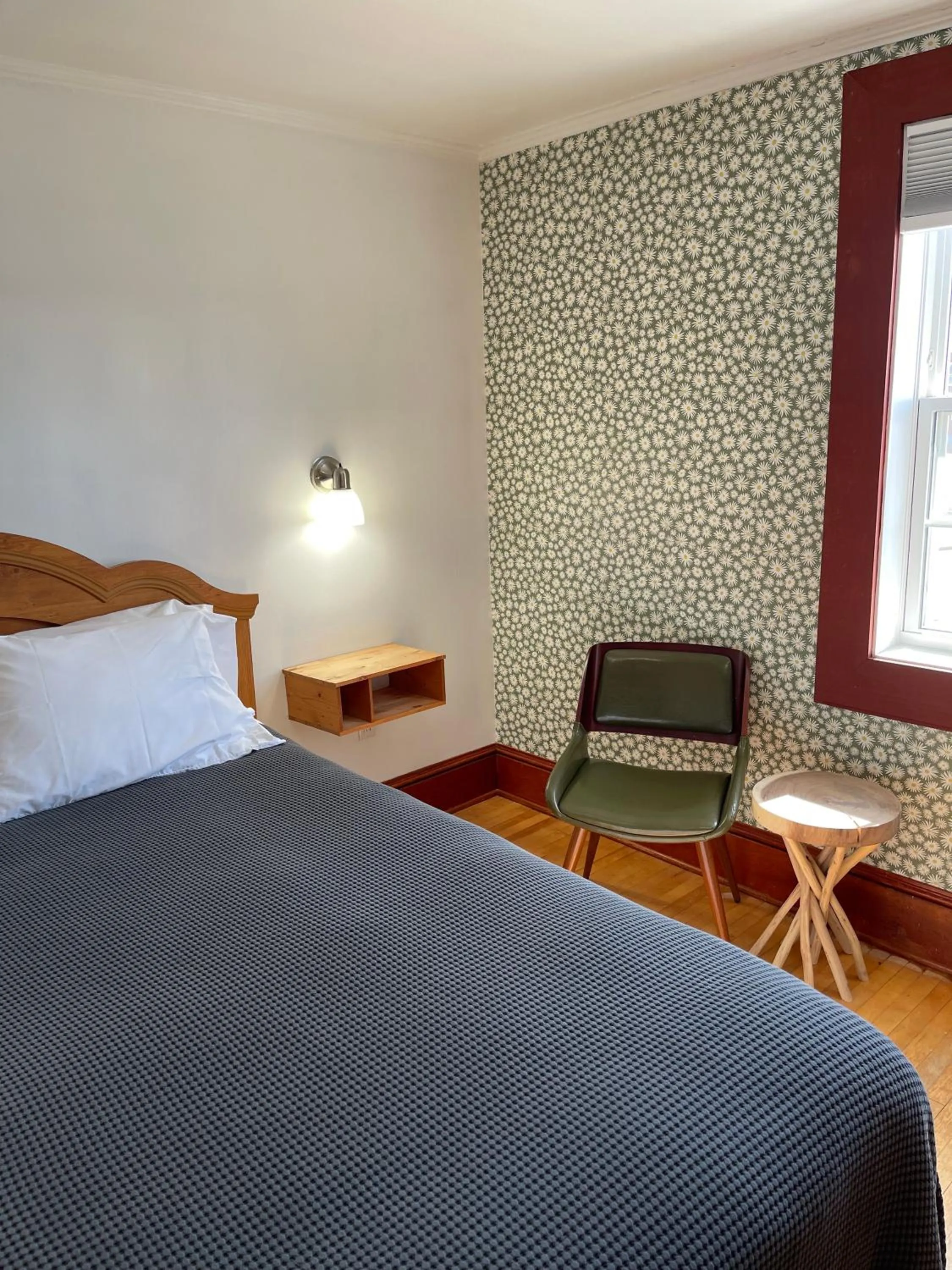 Bed in The Archie & Isidore Hotel