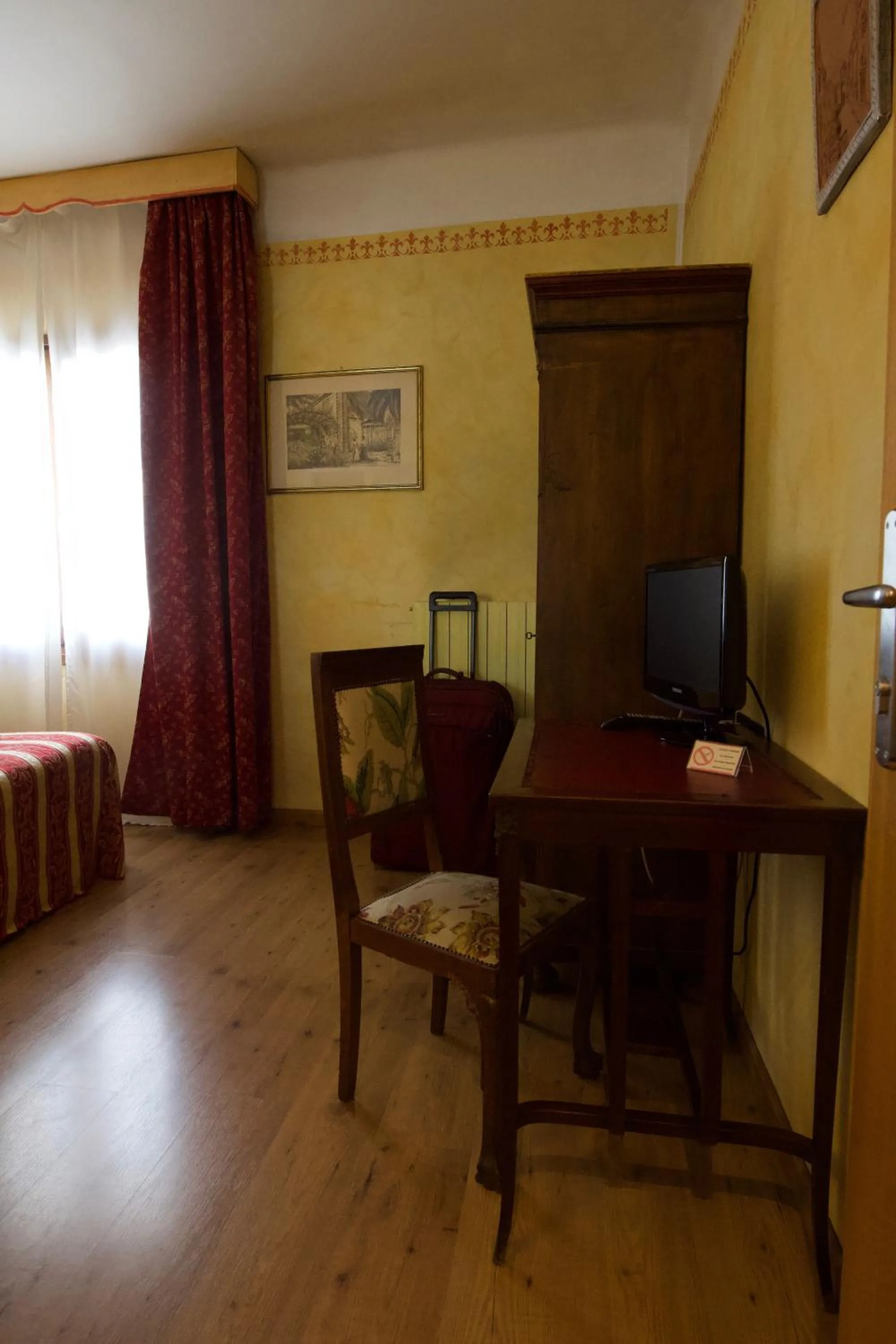 Bedroom in Locanda le Monache