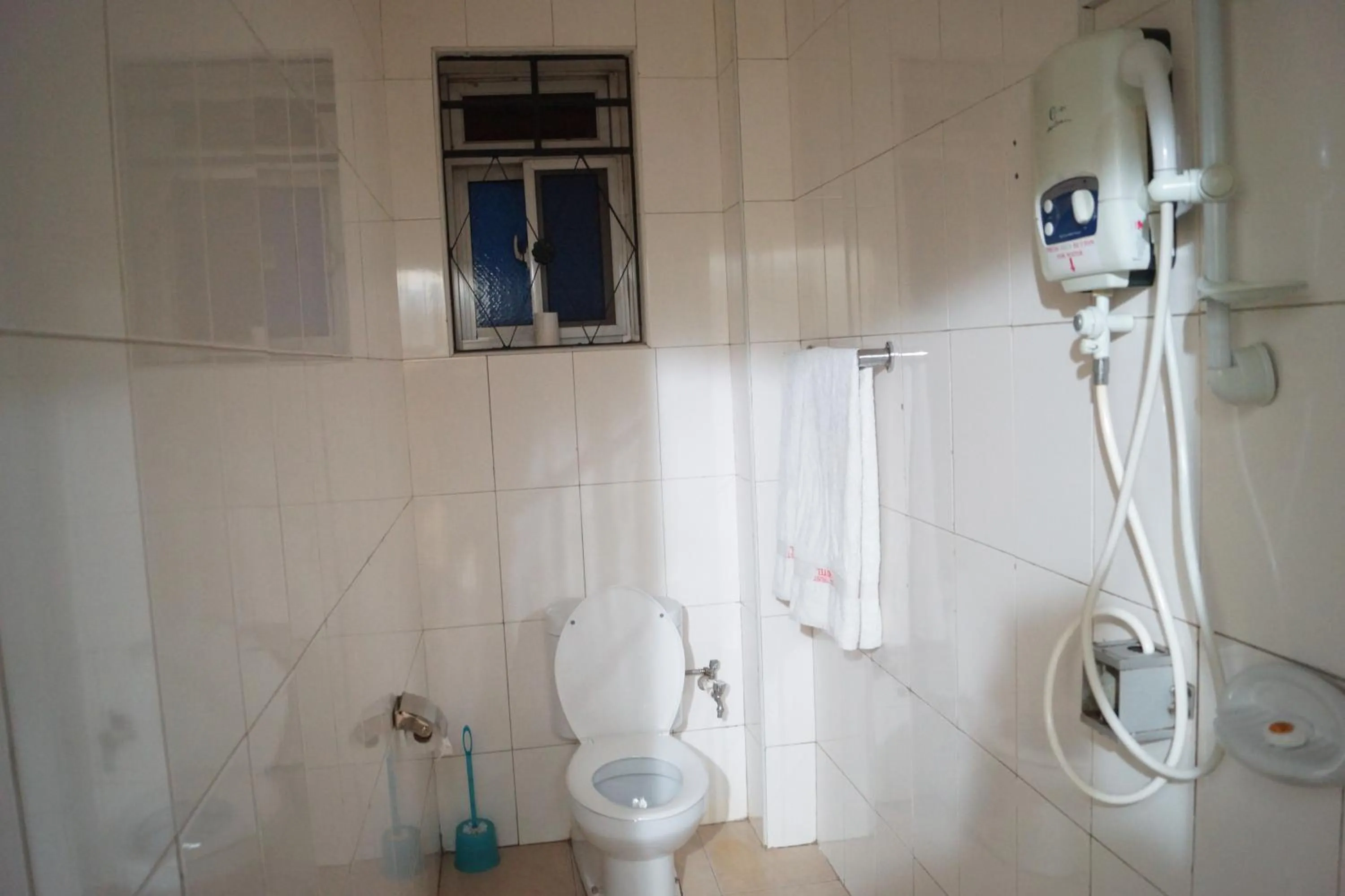 Bathroom in KK Trust Hotel Kampala