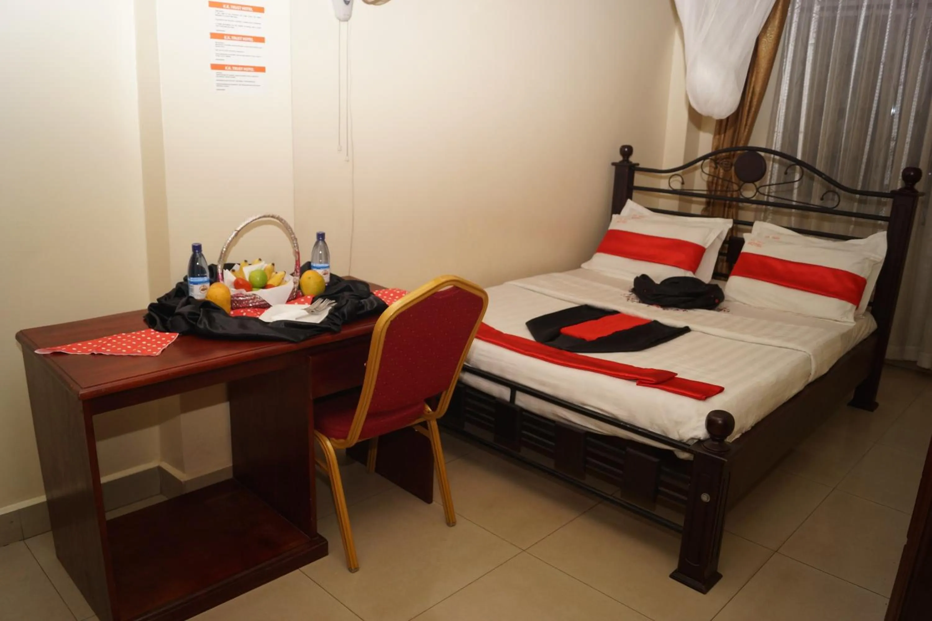 Bedroom in KK Trust Hotel Kampala
