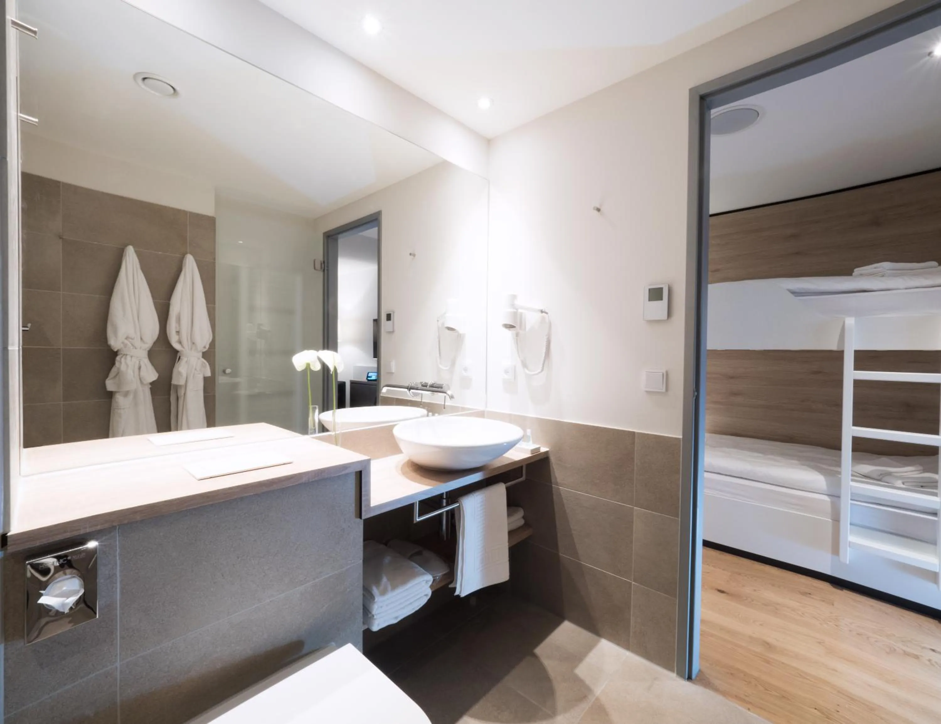 Bathroom, Bed in WONNEMAR Resort-Hotel