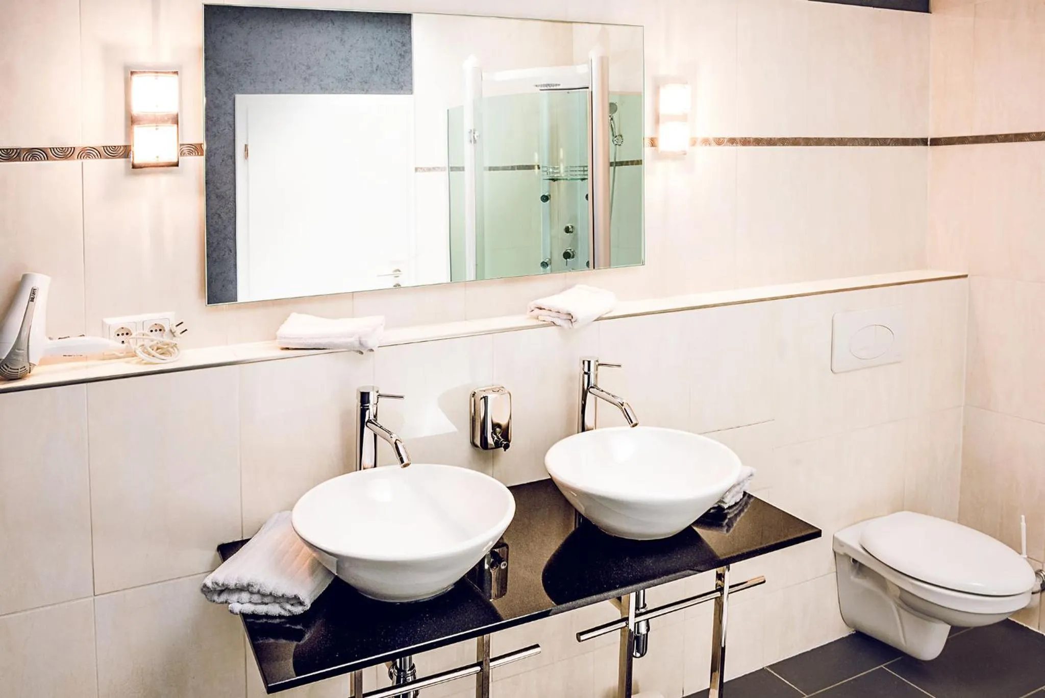 Bathroom in Hotel SleepInn Volkspark