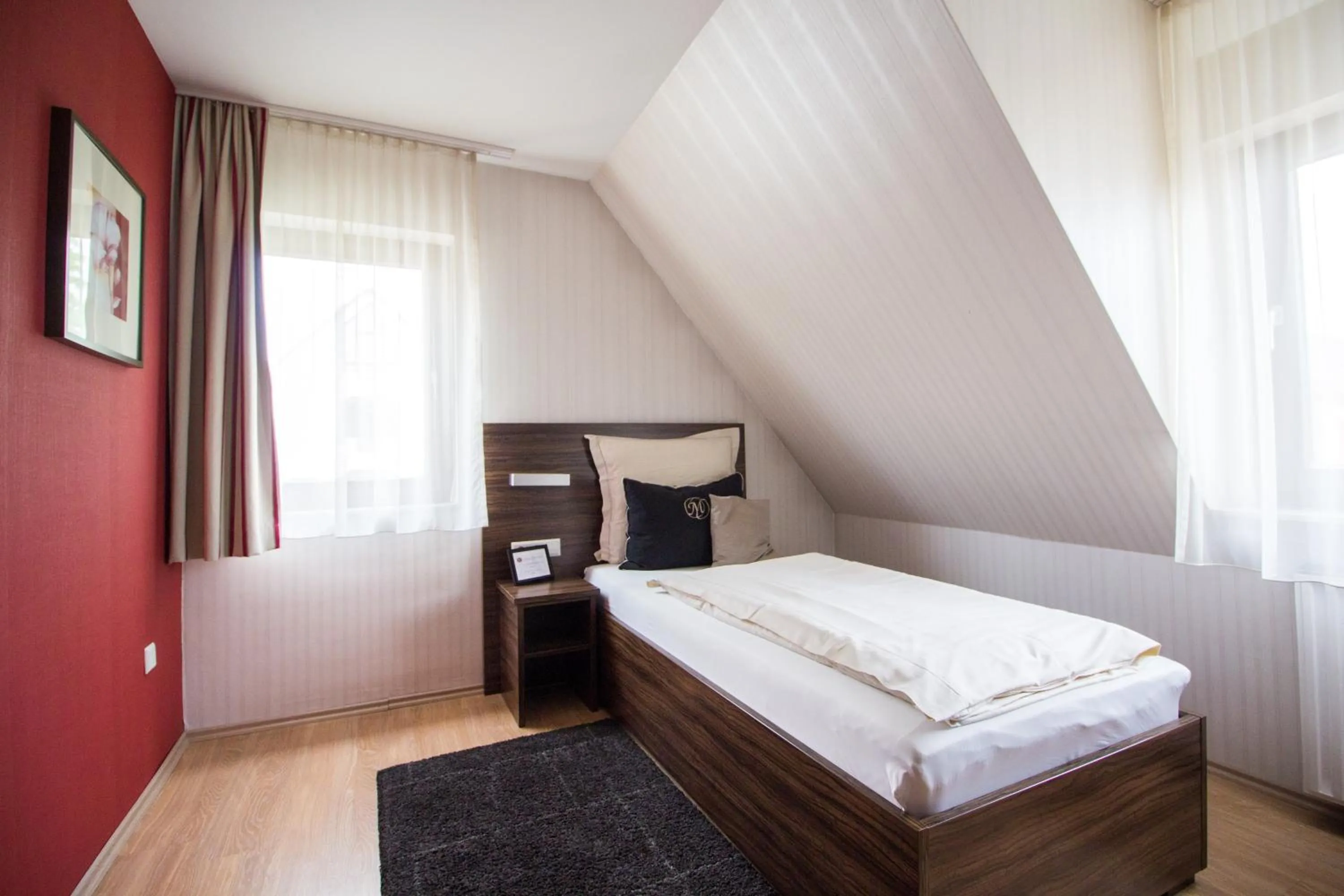 Photo of the whole room, Bed in Landhotel Wolfschlugen