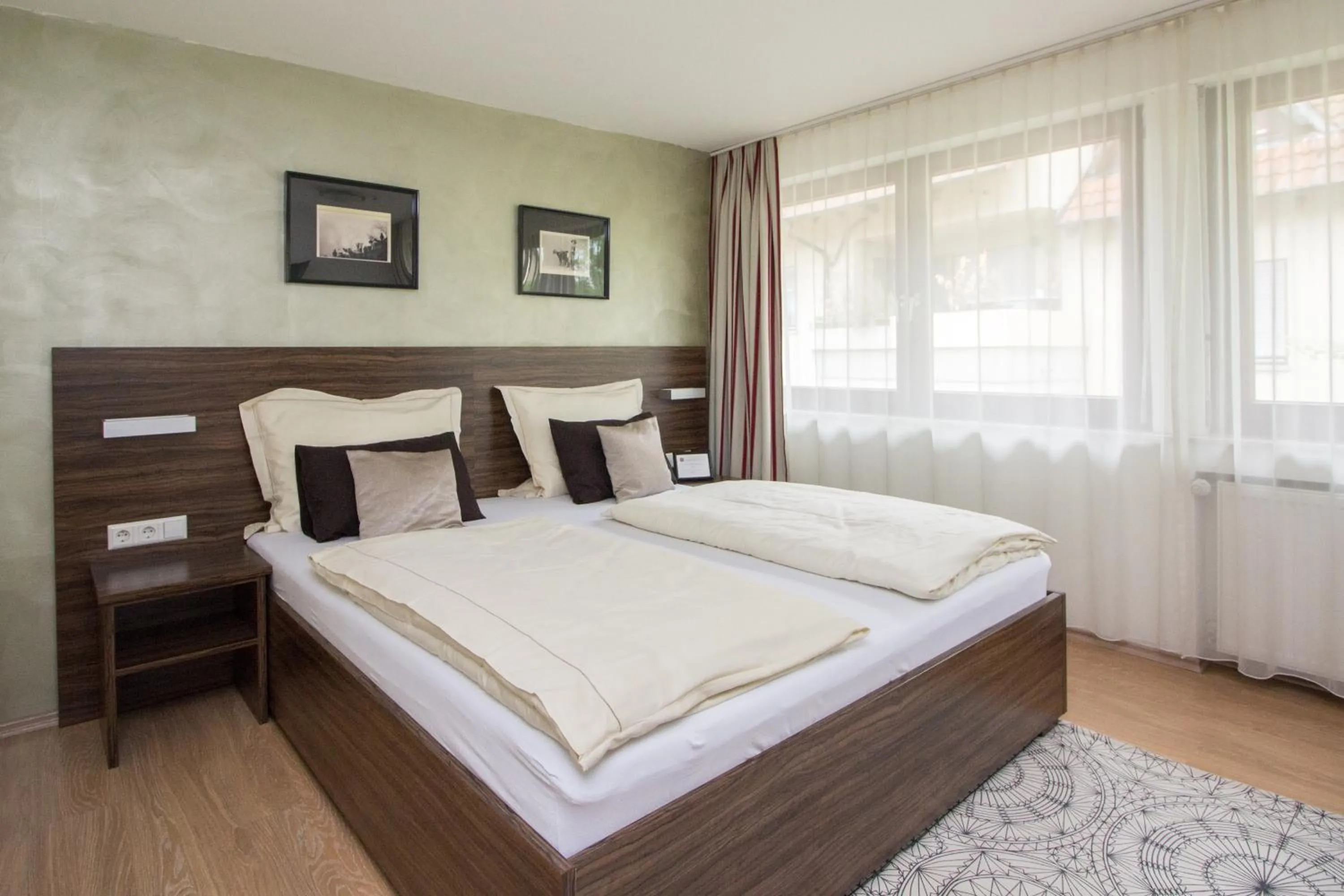 Photo of the whole room, Bed in Landhotel Wolfschlugen