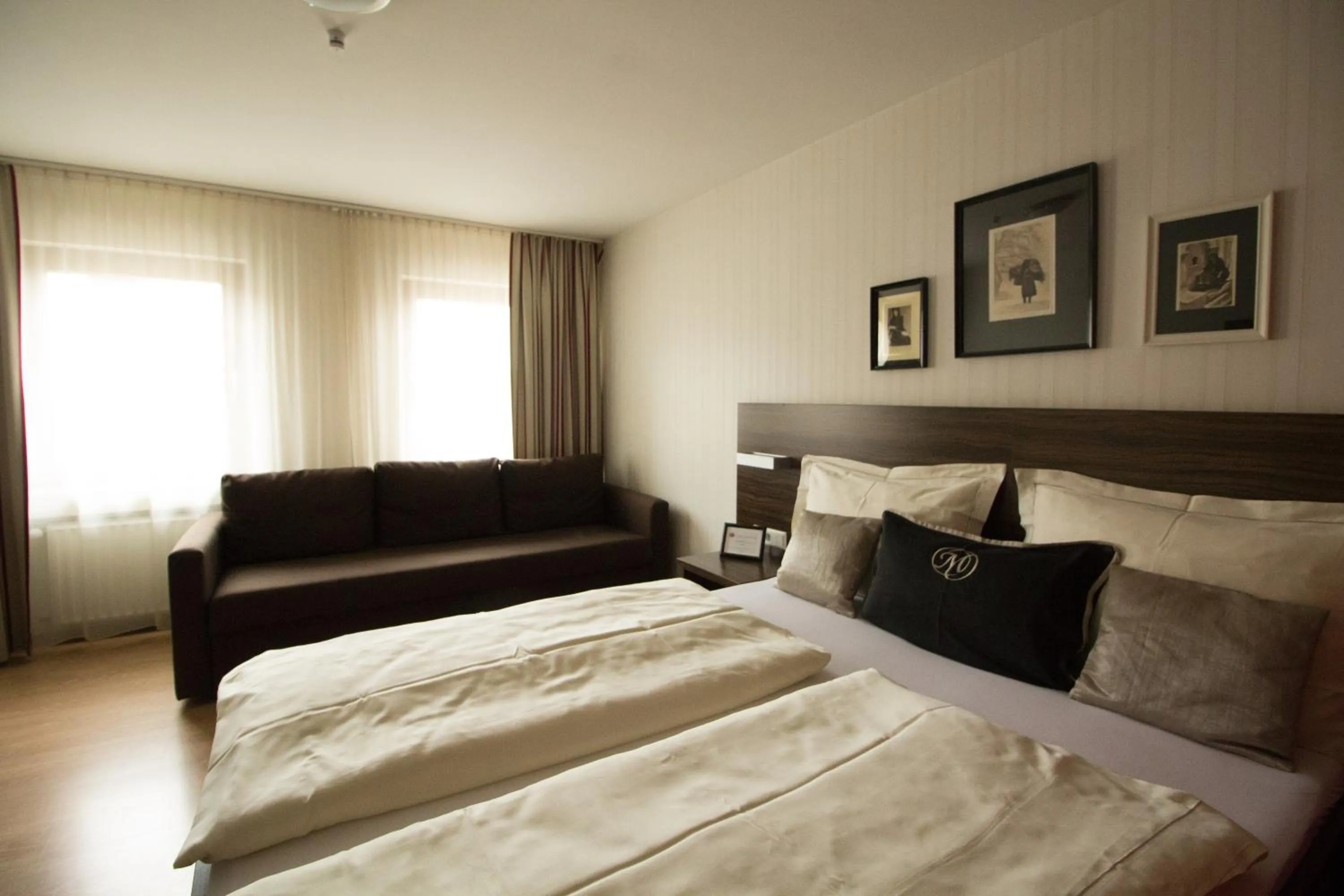 Photo of the whole room, Bed in Landhotel Wolfschlugen