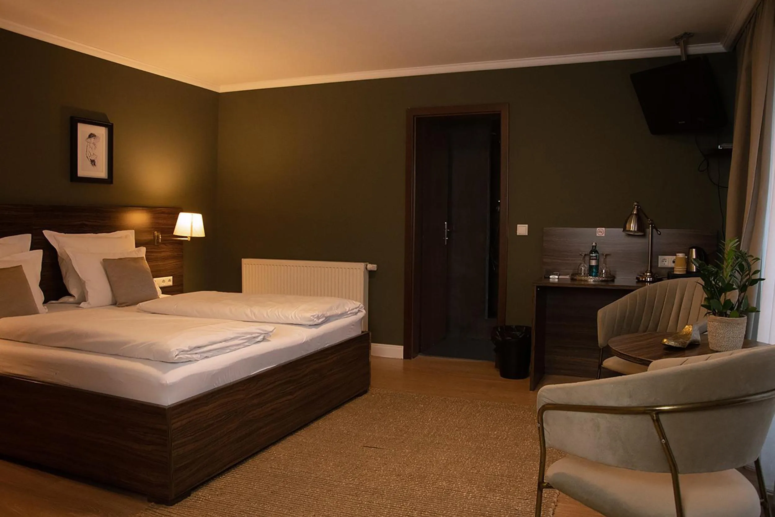 Photo of the whole room, Bed in Landhotel Wolfschlugen