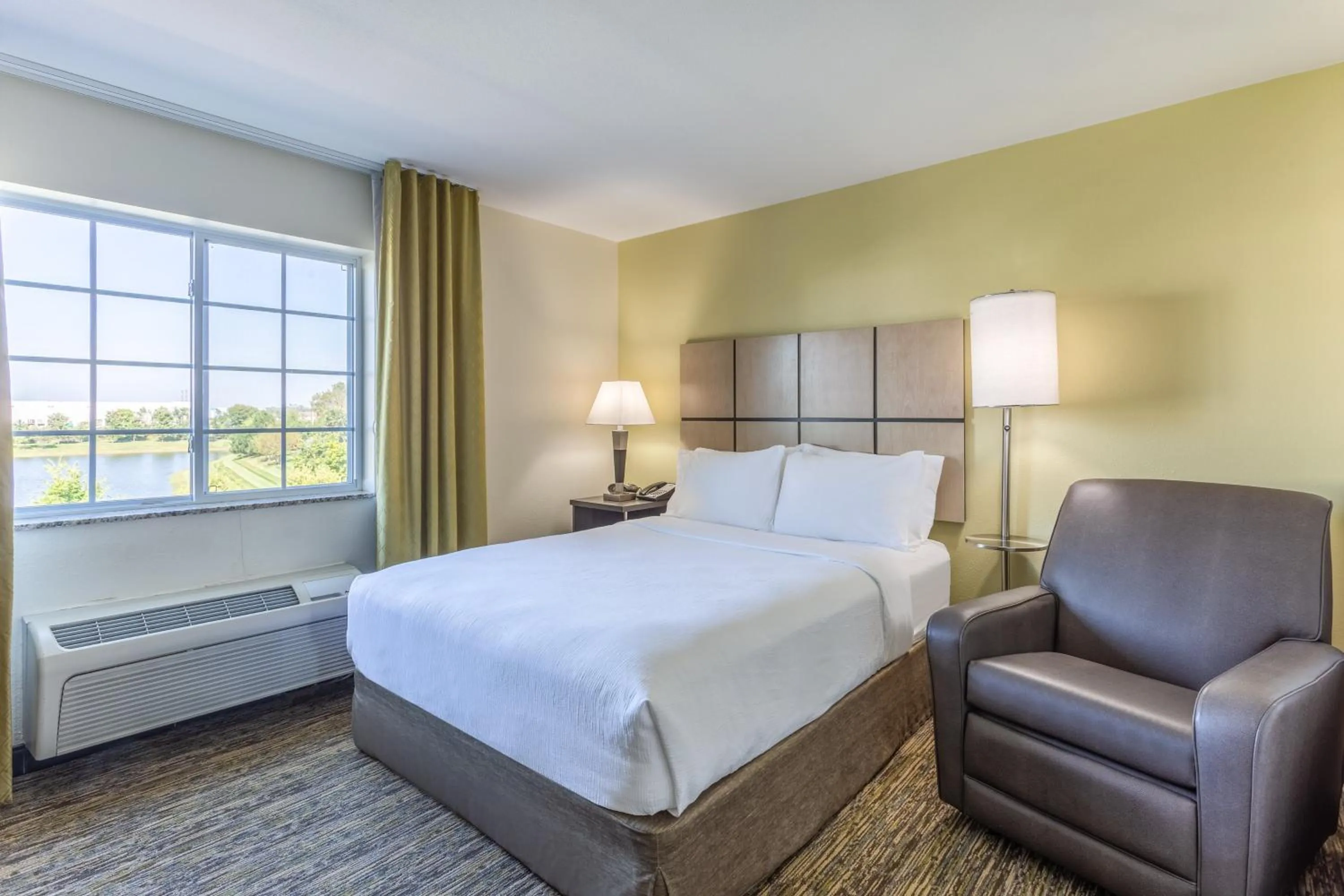 Photo of the whole room, Bed in Candlewood Suites Aurora-Naperville by IHG
