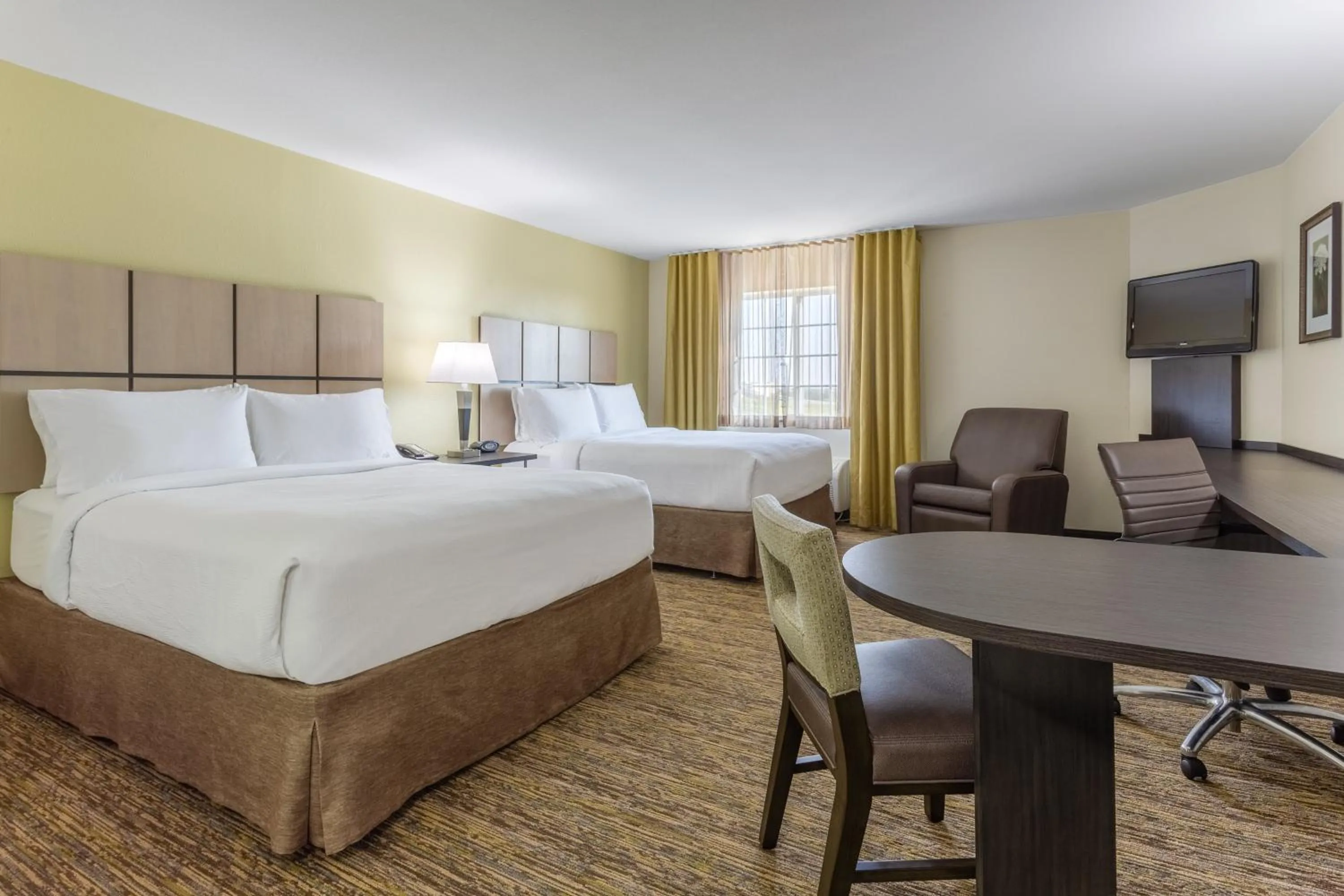 Photo of the whole room, Bed in Candlewood Suites Aurora-Naperville by IHG