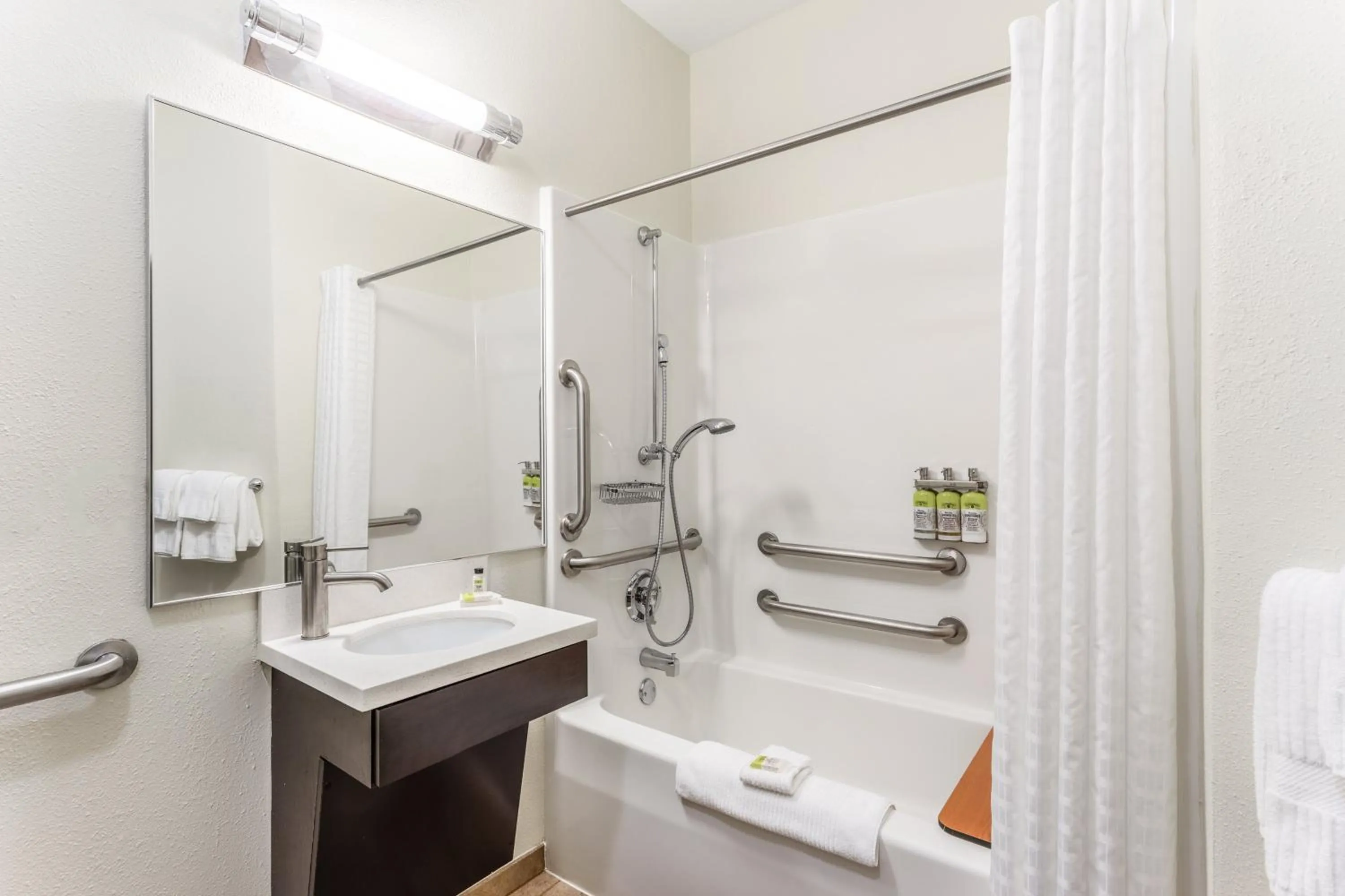Bathroom in Candlewood Suites Aurora-Naperville by IHG