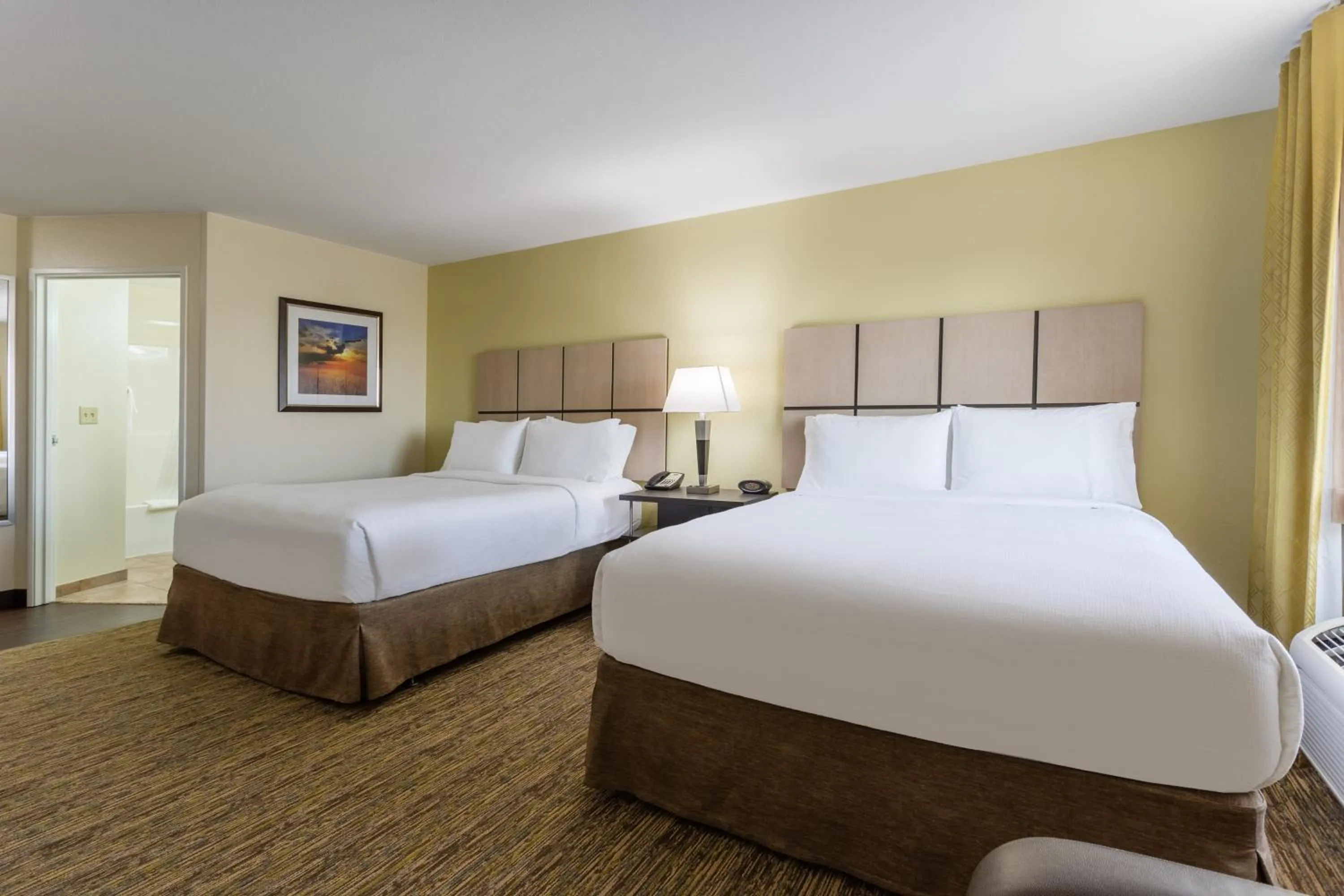Photo of the whole room, Bed in Candlewood Suites Aurora-Naperville by IHG
