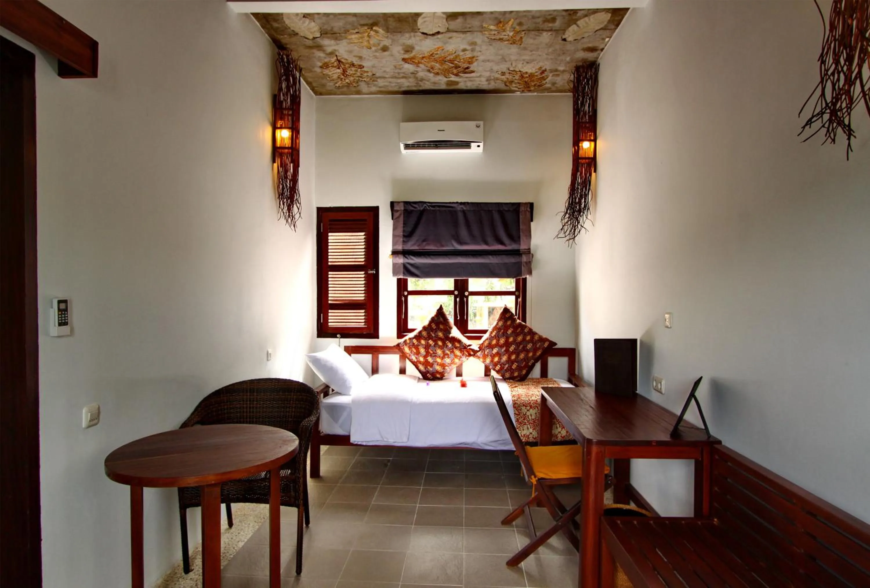 Bed in Cocotinos Lembeh a Boutique Dive Lodge