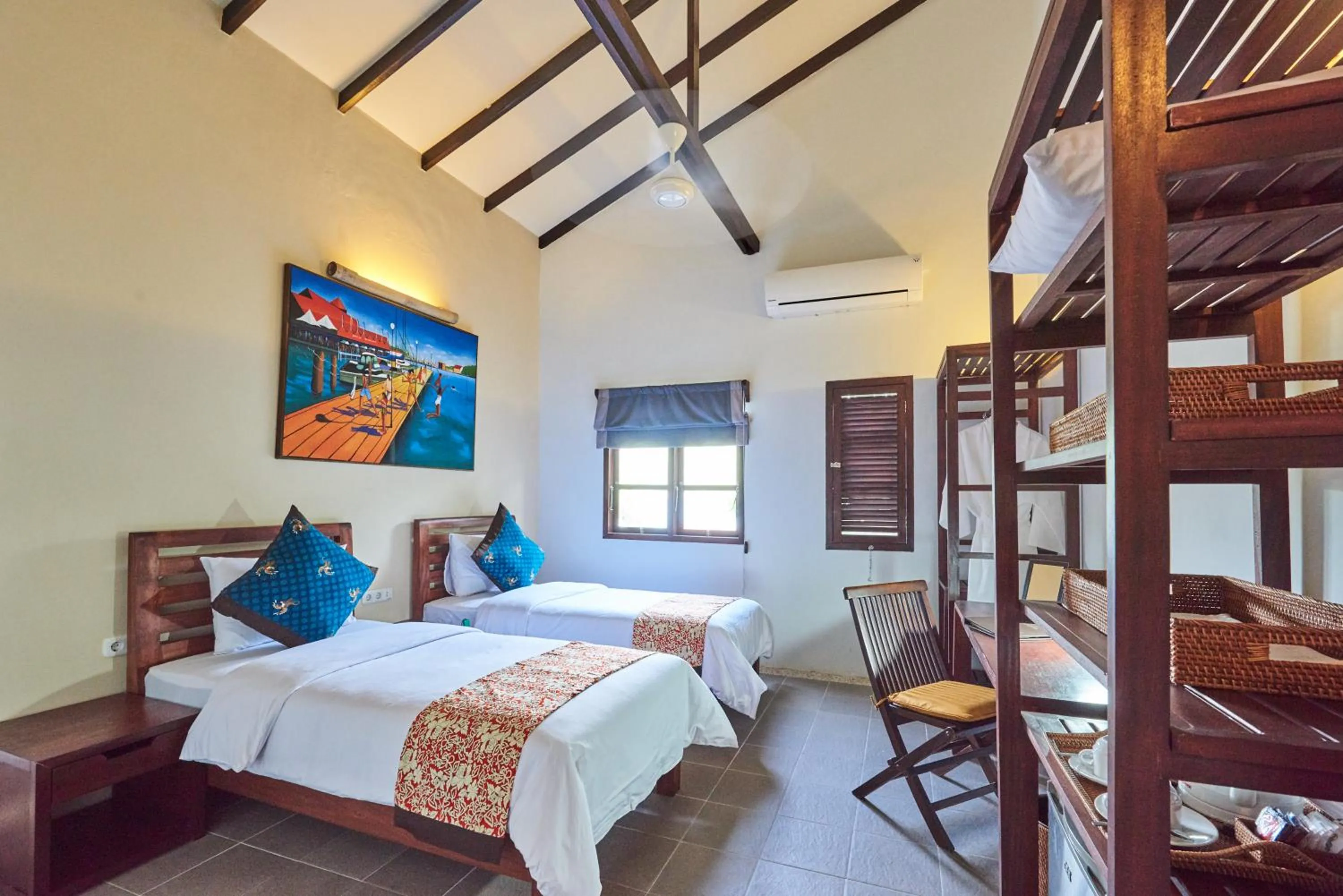 Bed in Cocotinos Lembeh a Boutique Dive Lodge