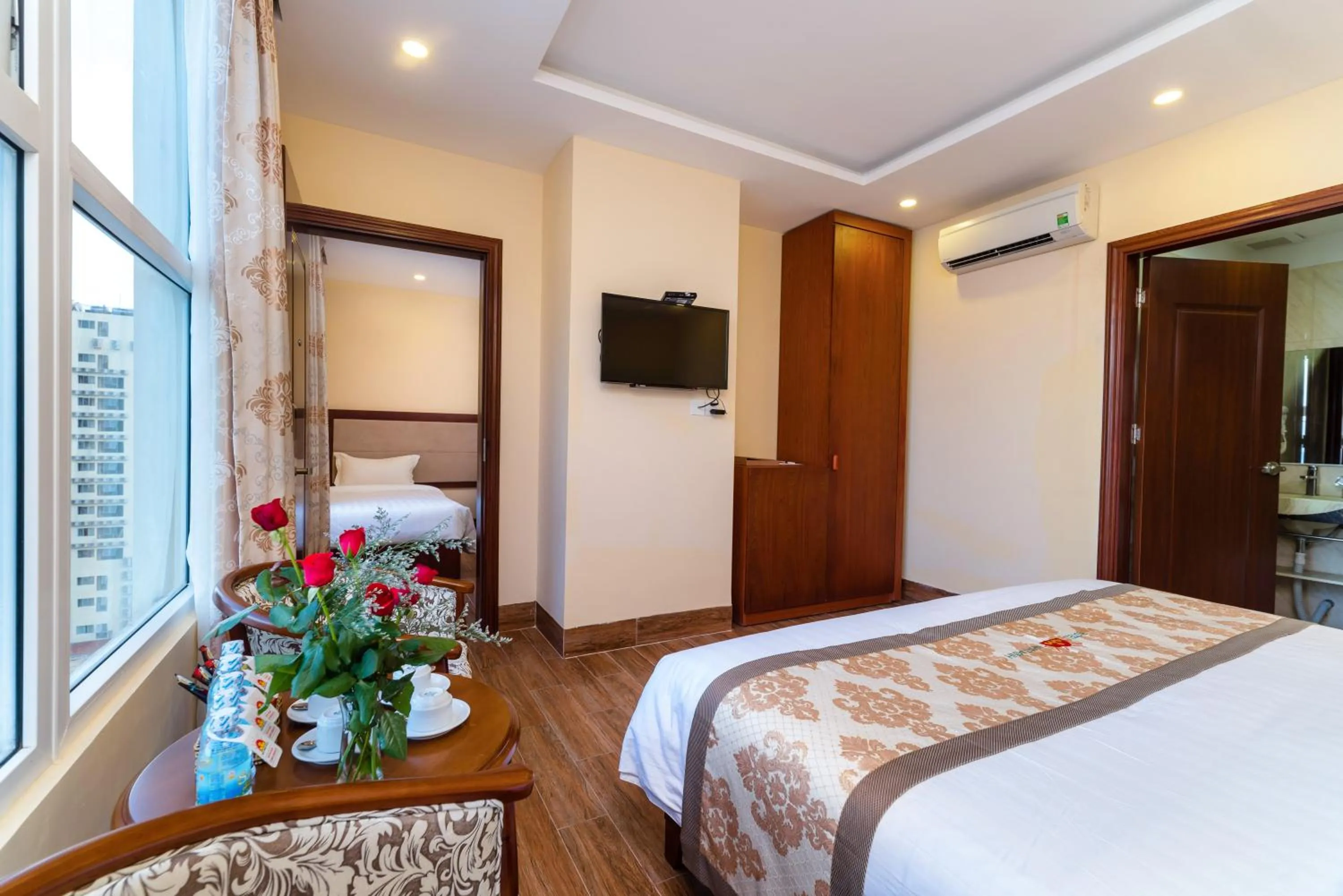 Seating area, Bed in Nhat Minh Hotel and Apartment