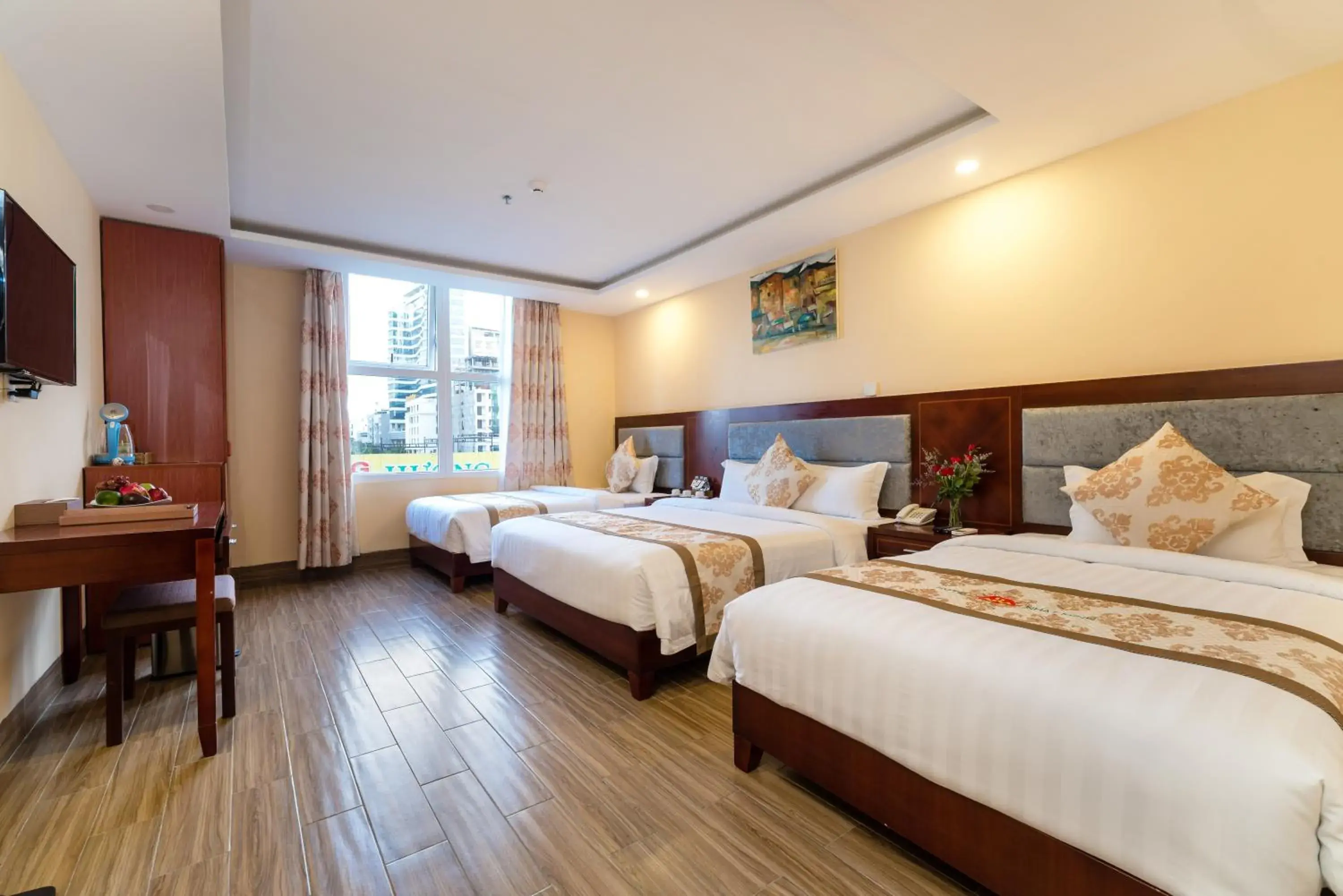Deluxe Triple Room in Nhat Minh Hotel and Apartment Deluxe Triple Room in Nhat Minh Hotel and Apartment