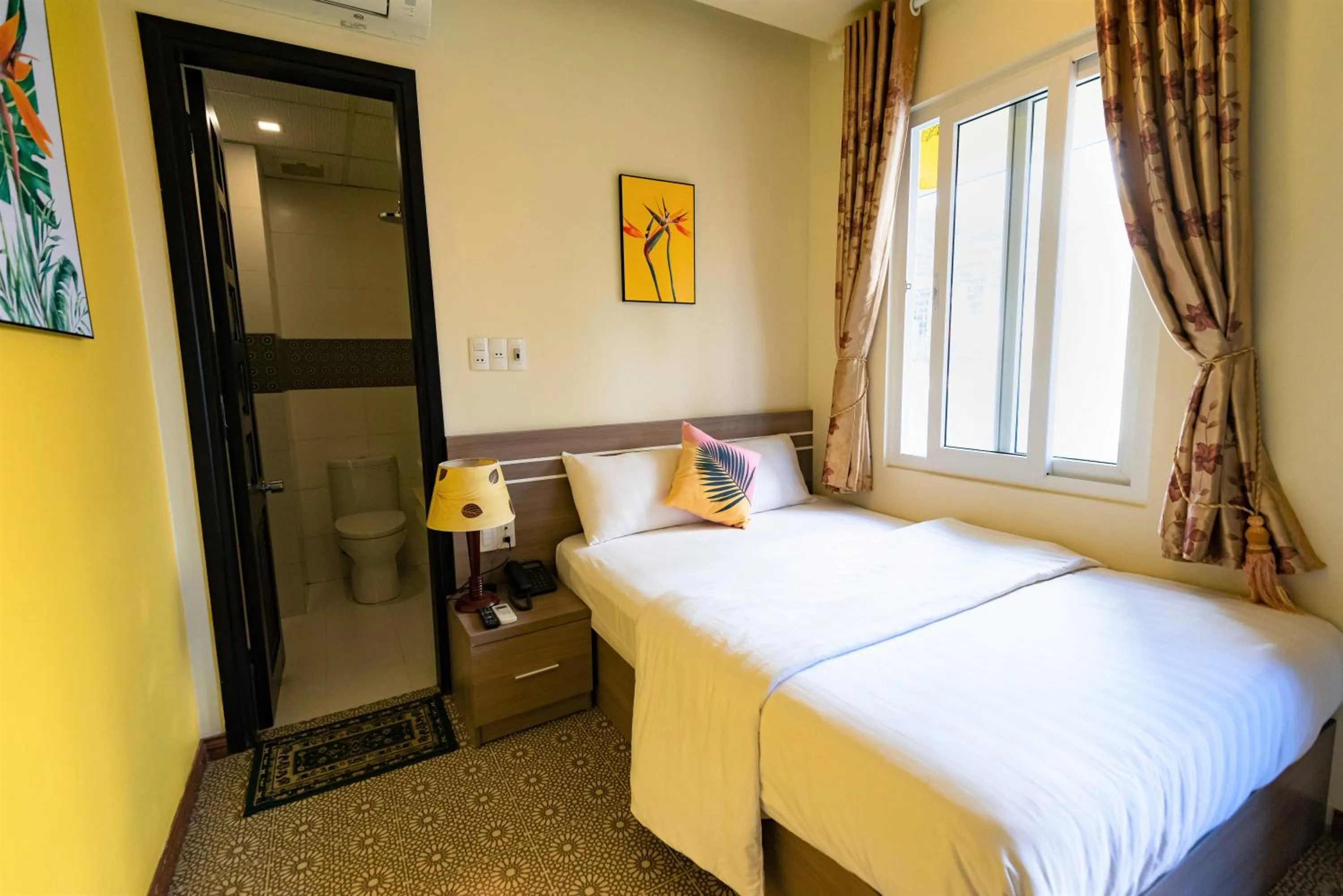 Bed in Flora Hotel Hue