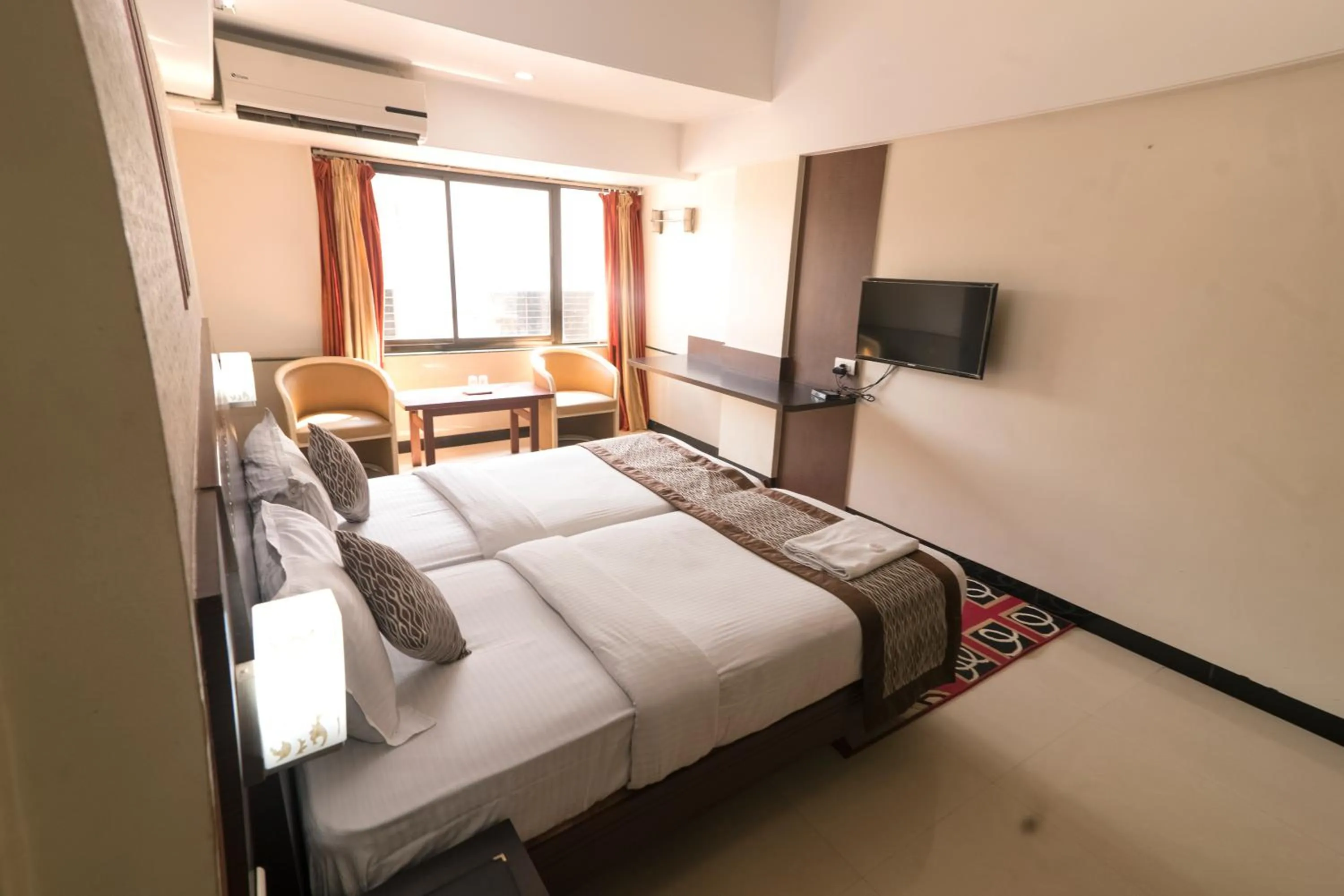 Bed in Hotel Ayodhya