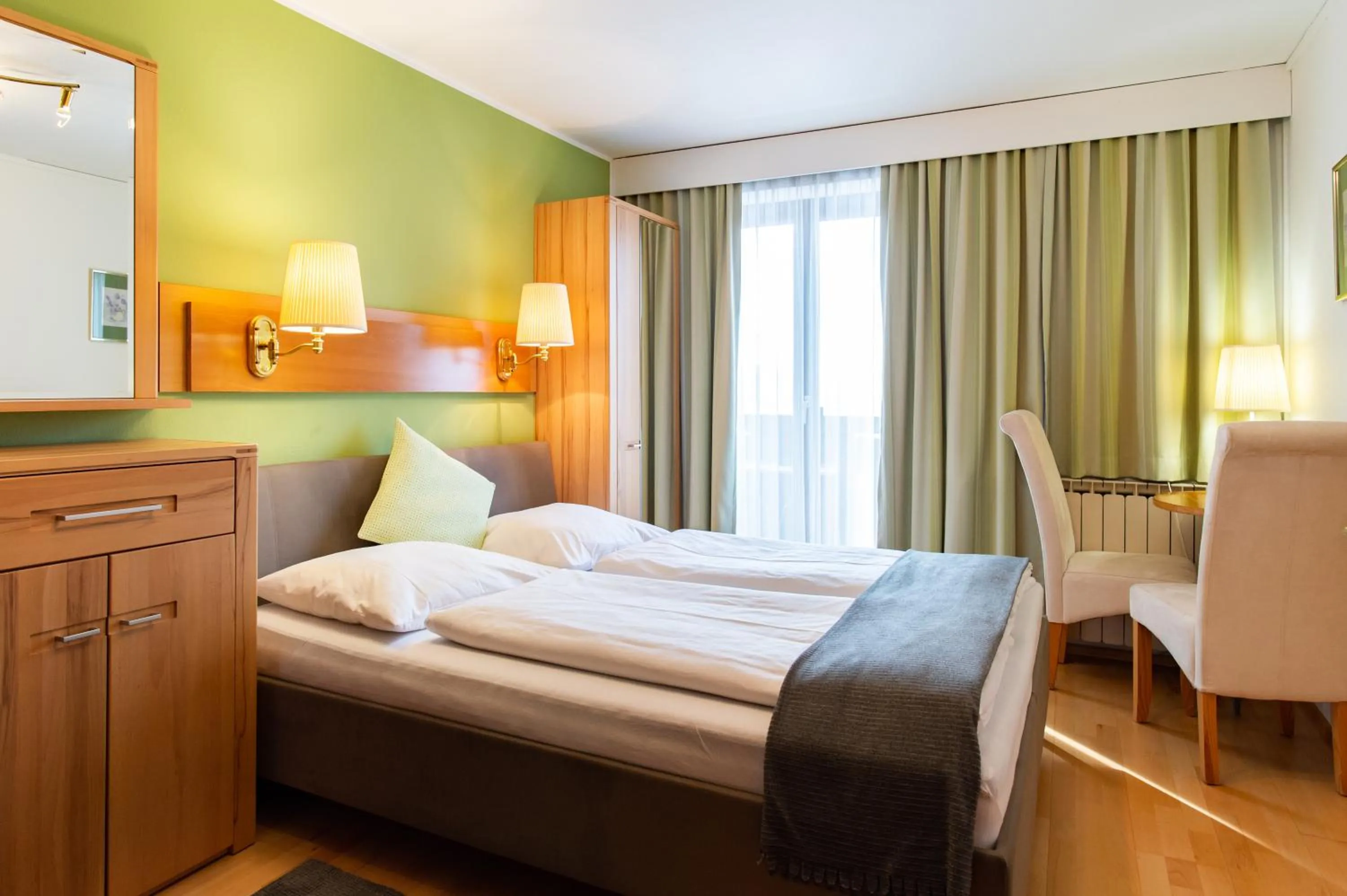 Photo of the whole room, Bed in Haus Salzburgblick (ehem. Haus Elisabeth)