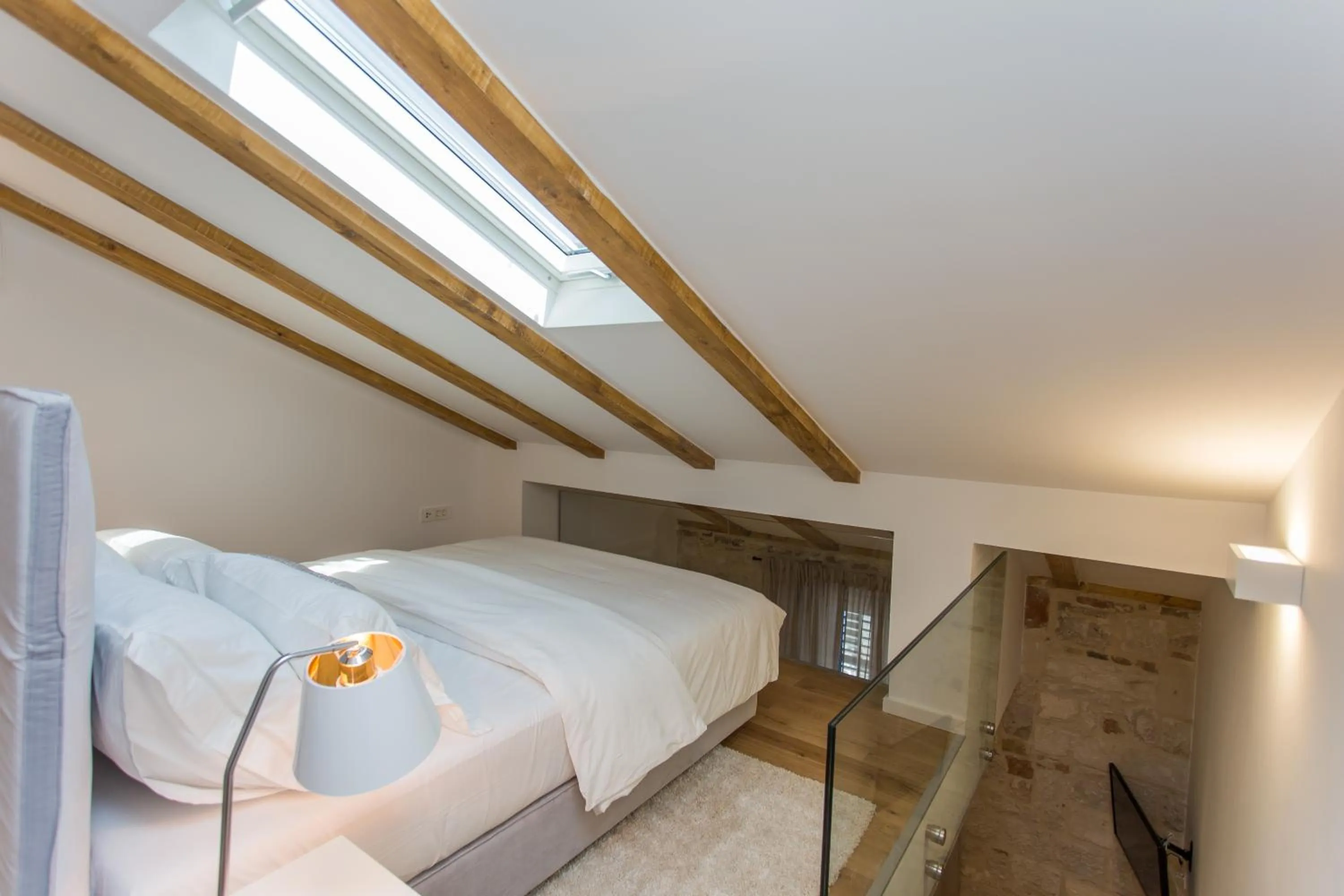 Bed in Bifora Heritage Hotel