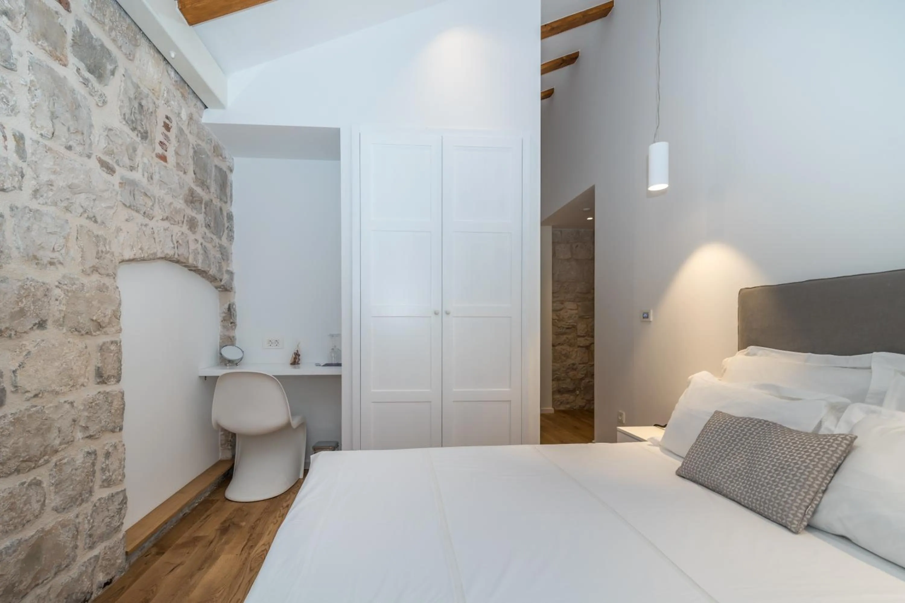 Bed in Bifora Heritage Hotel