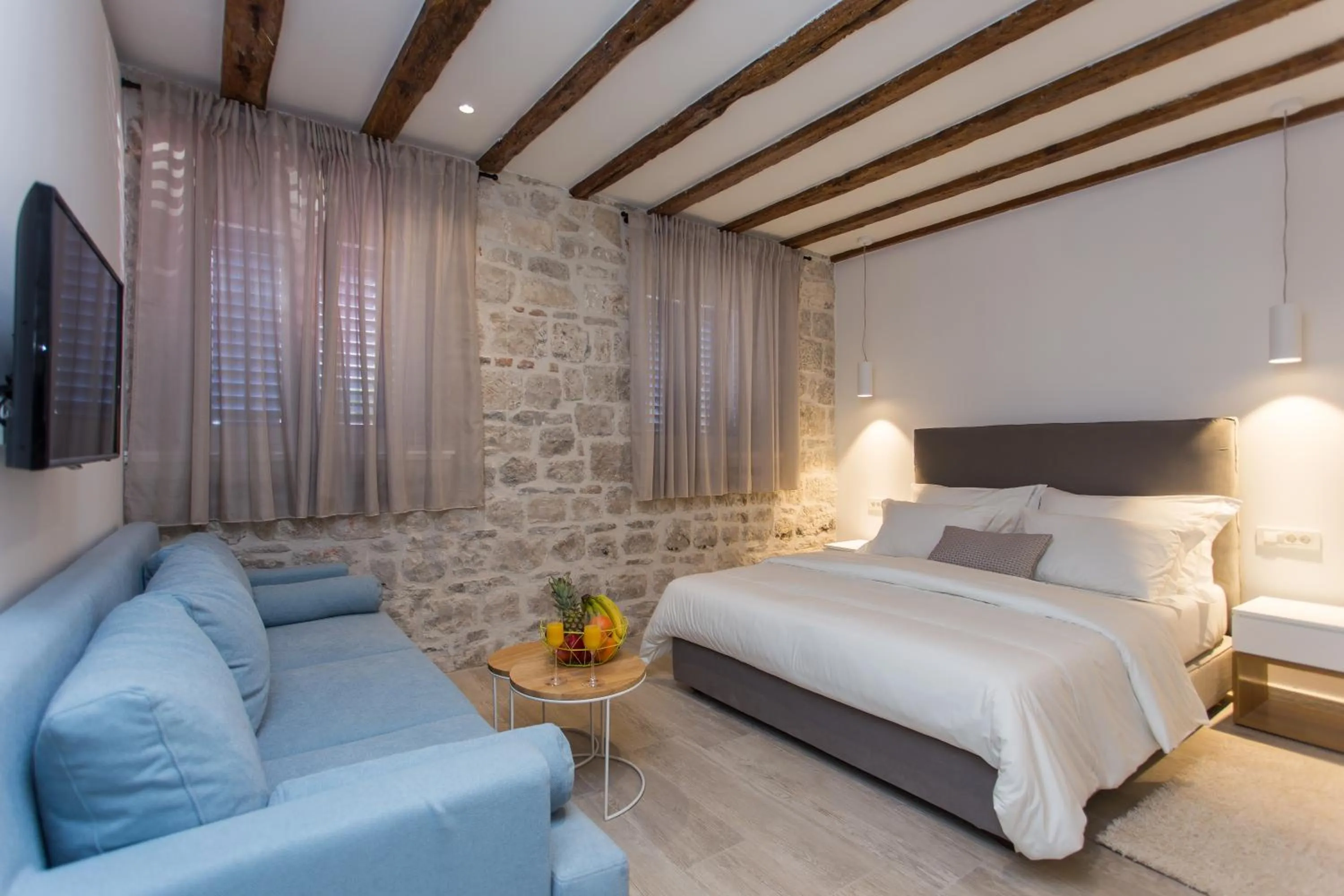 Bed in Bifora Heritage Hotel