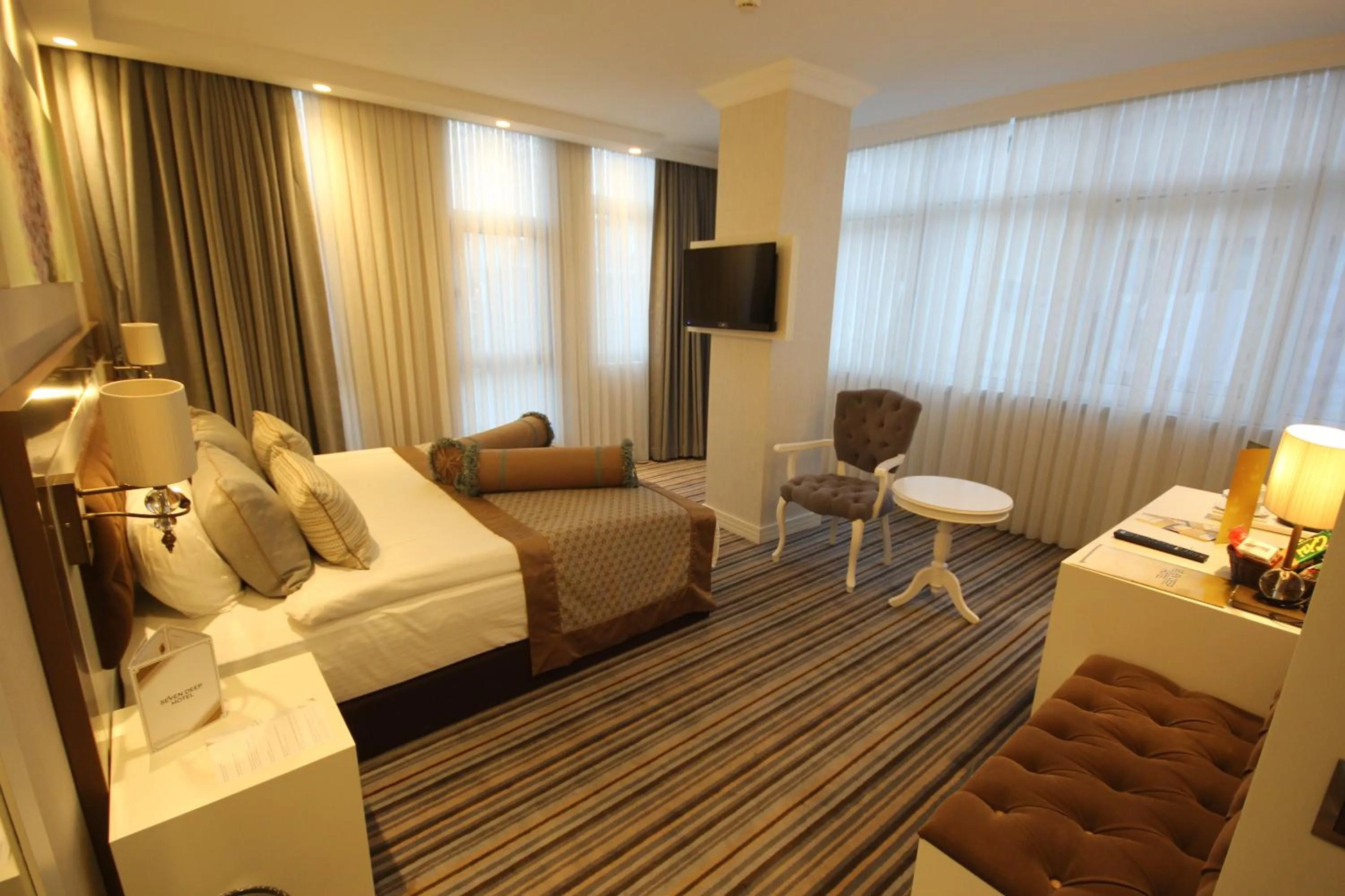 Bed in Seven Deep Hotel