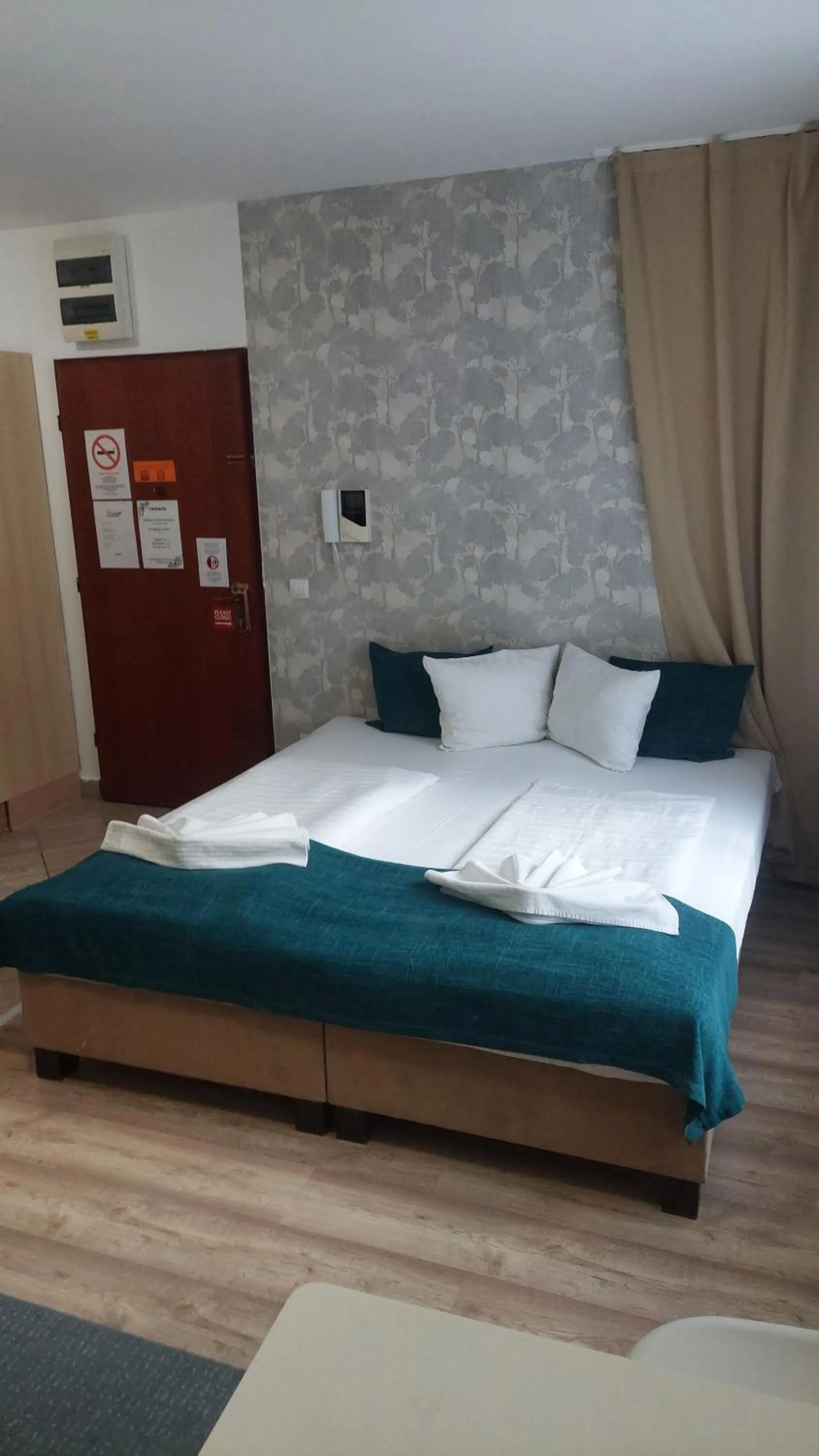 Bed in Mango Apartments