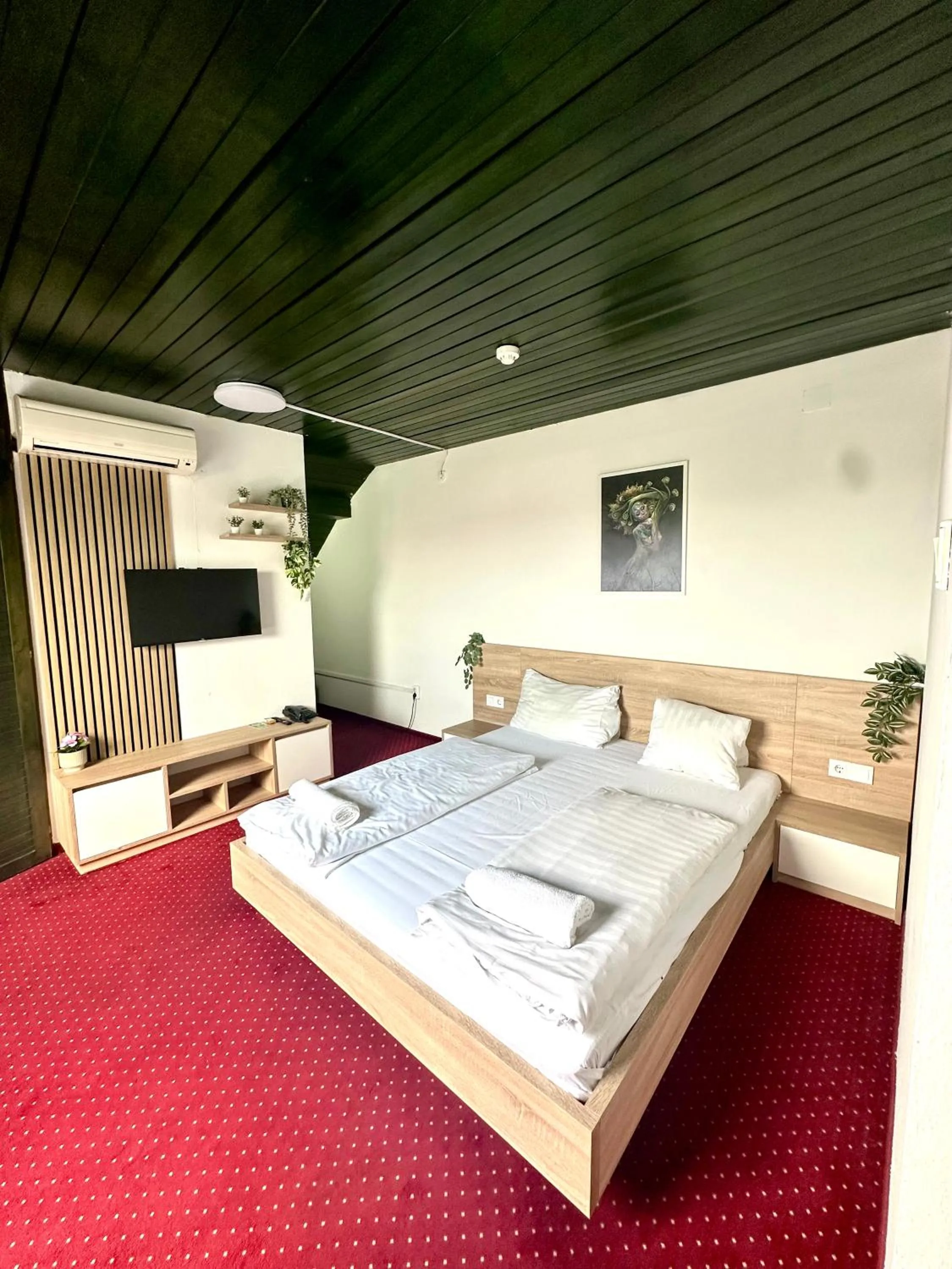 Bed in Hotel Amadeus