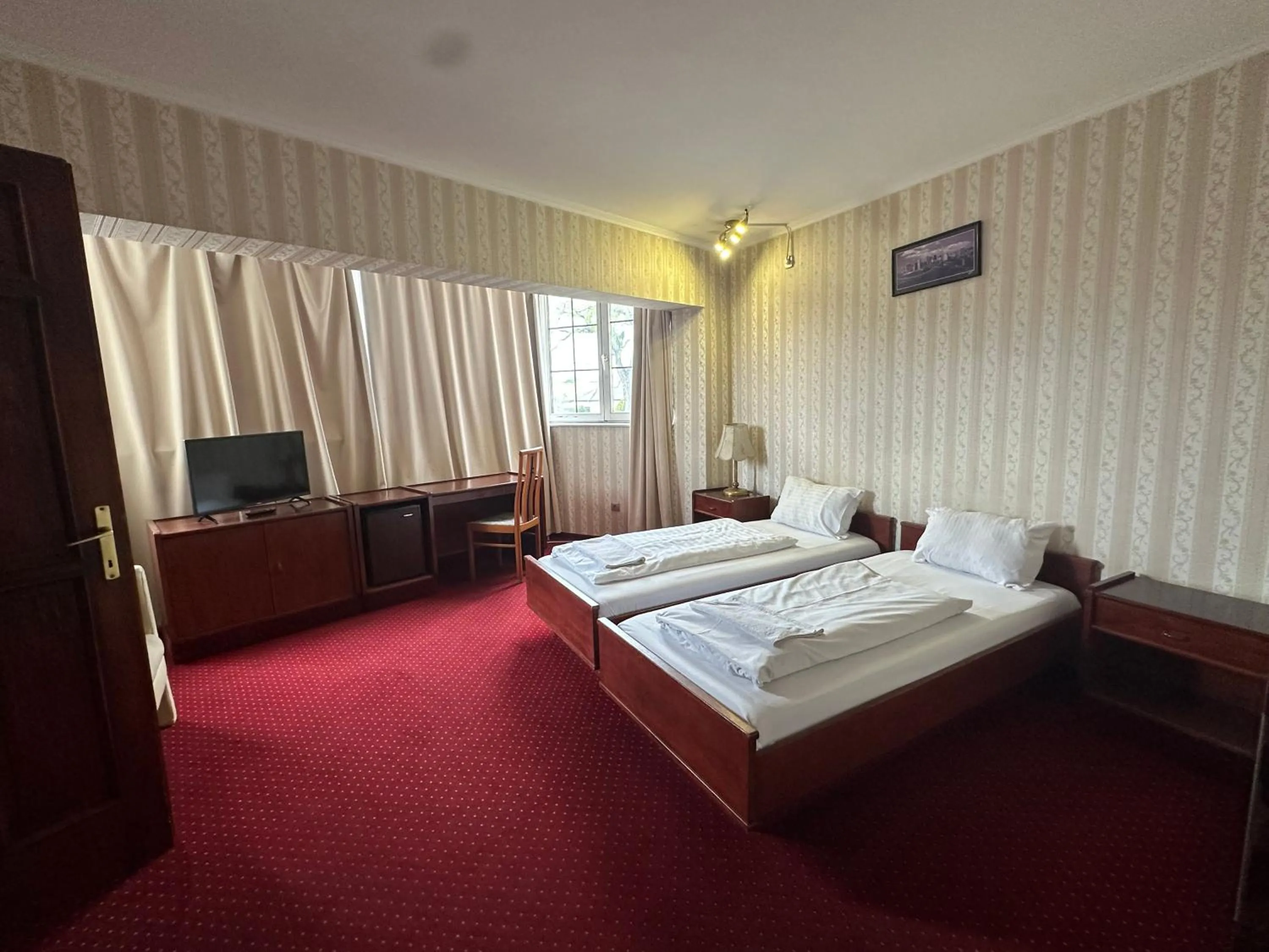 Bed in Hotel Amadeus