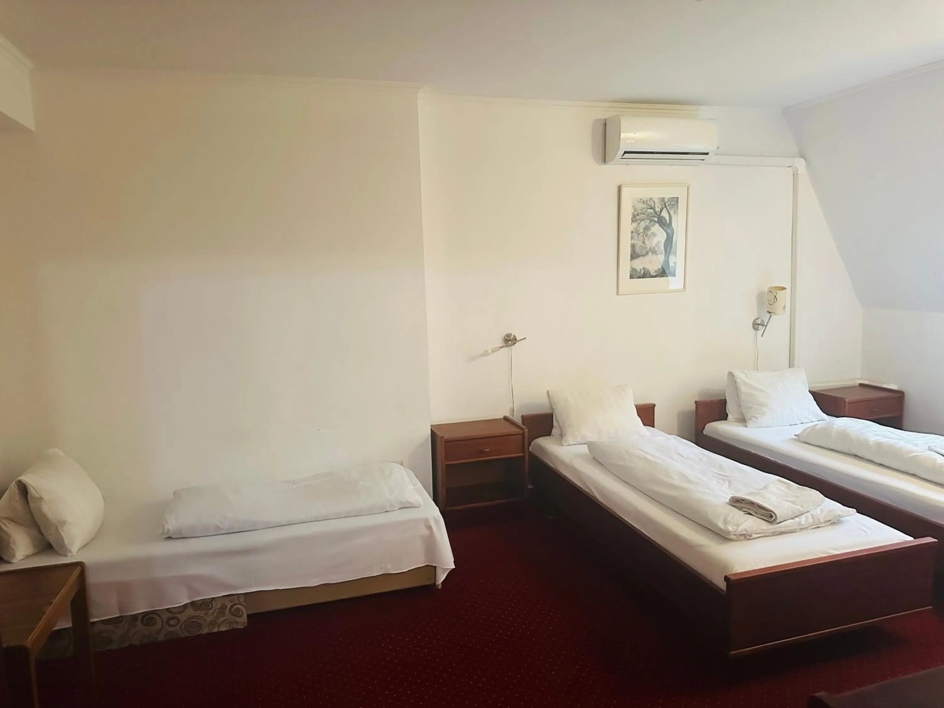 Bed in Hotel Amadeus