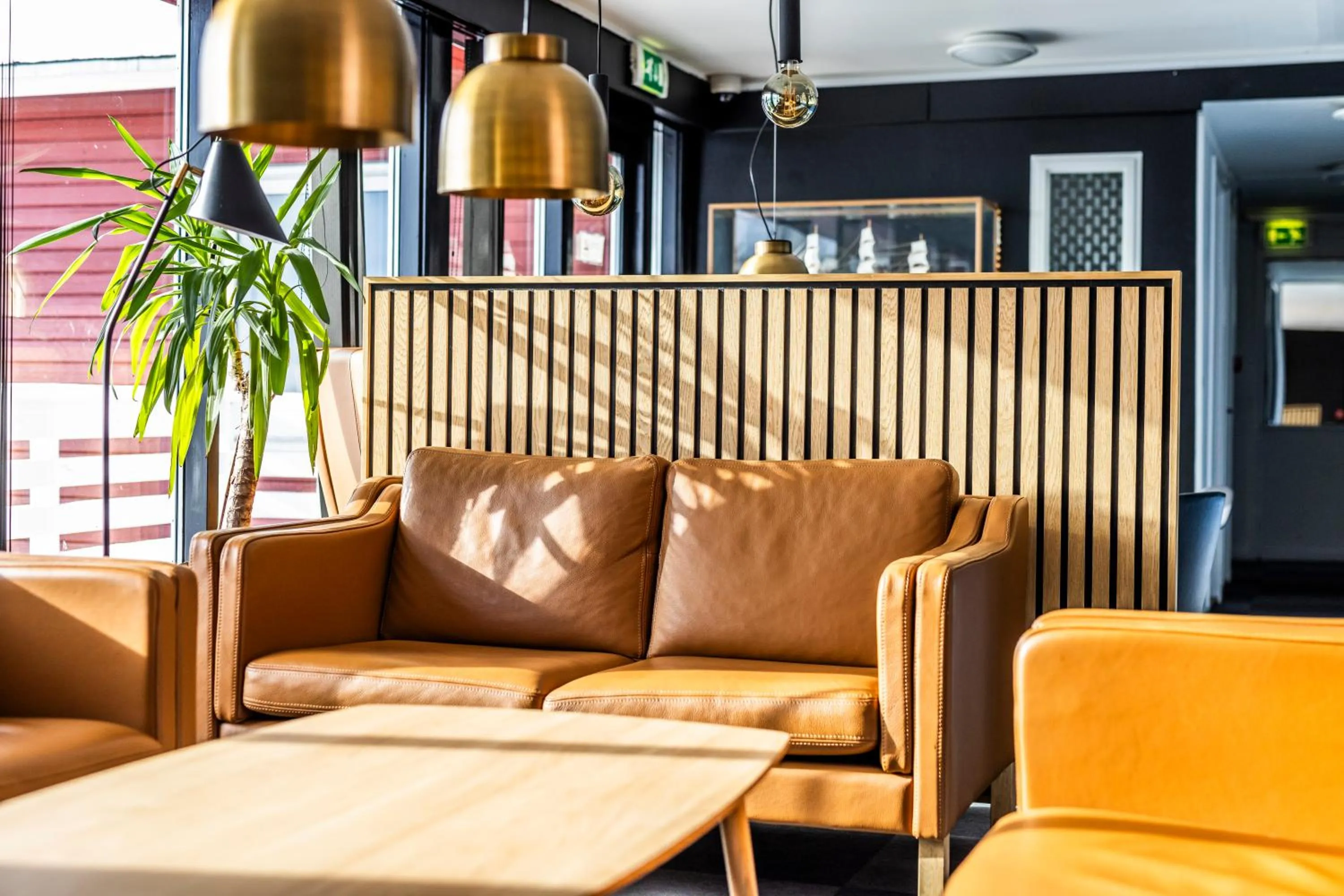 Communal lounge/ TV room in HOTEL SØMA Nuuk