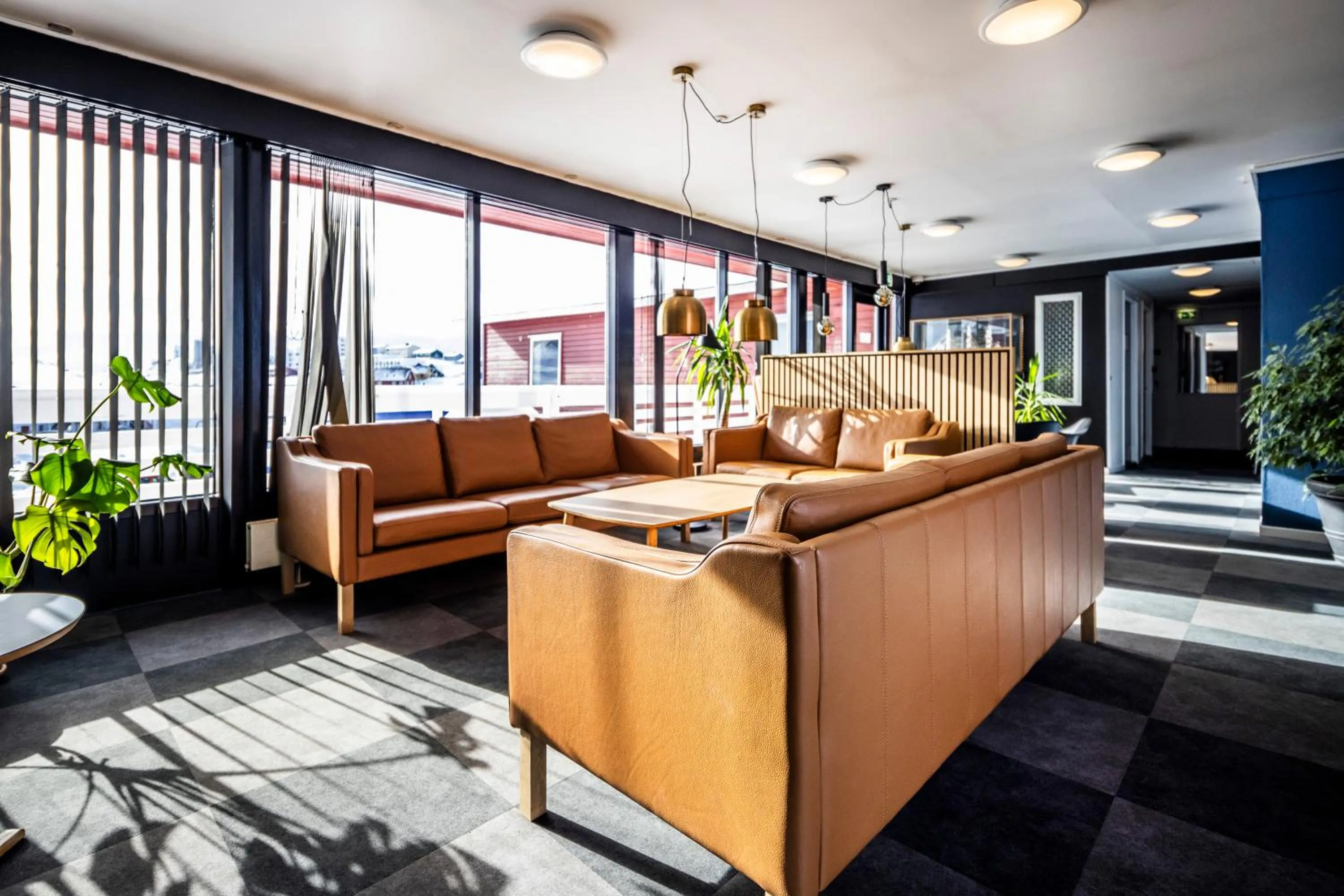 Communal lounge/ TV room in HOTEL SØMA Nuuk