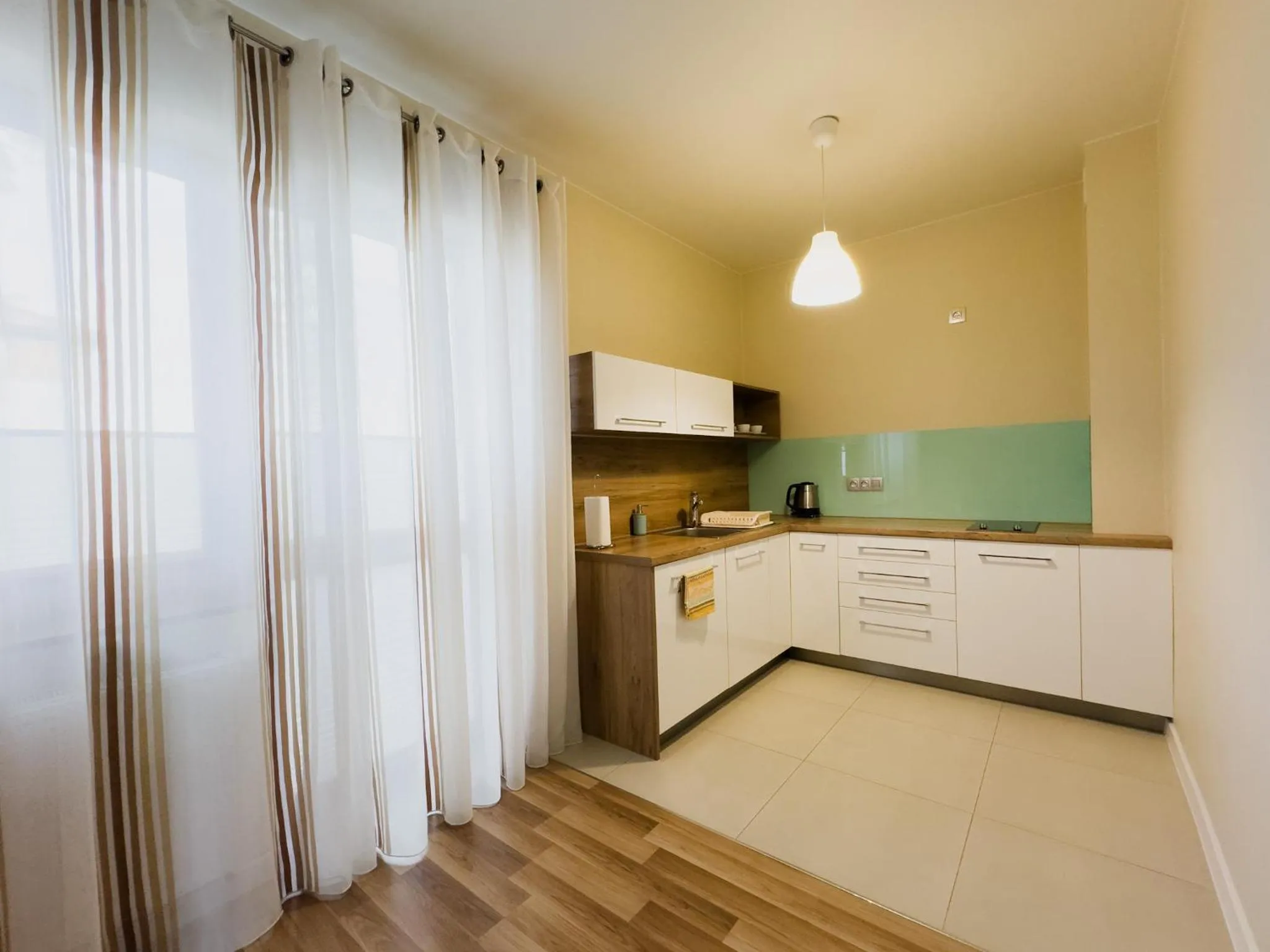 Kitchen or kitchenette in Rosa Apartamenty