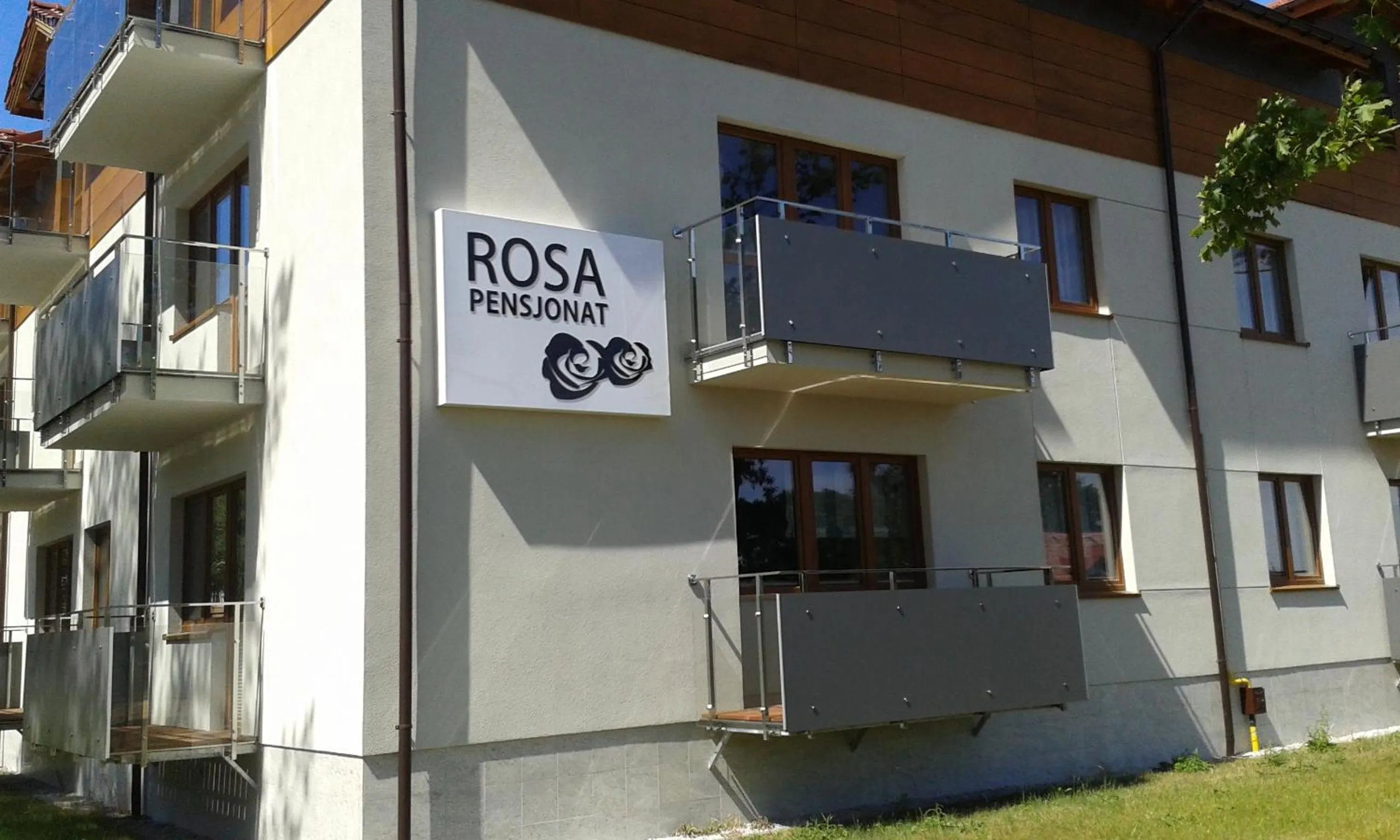 Property logo or sign in Rosa Apartamenty