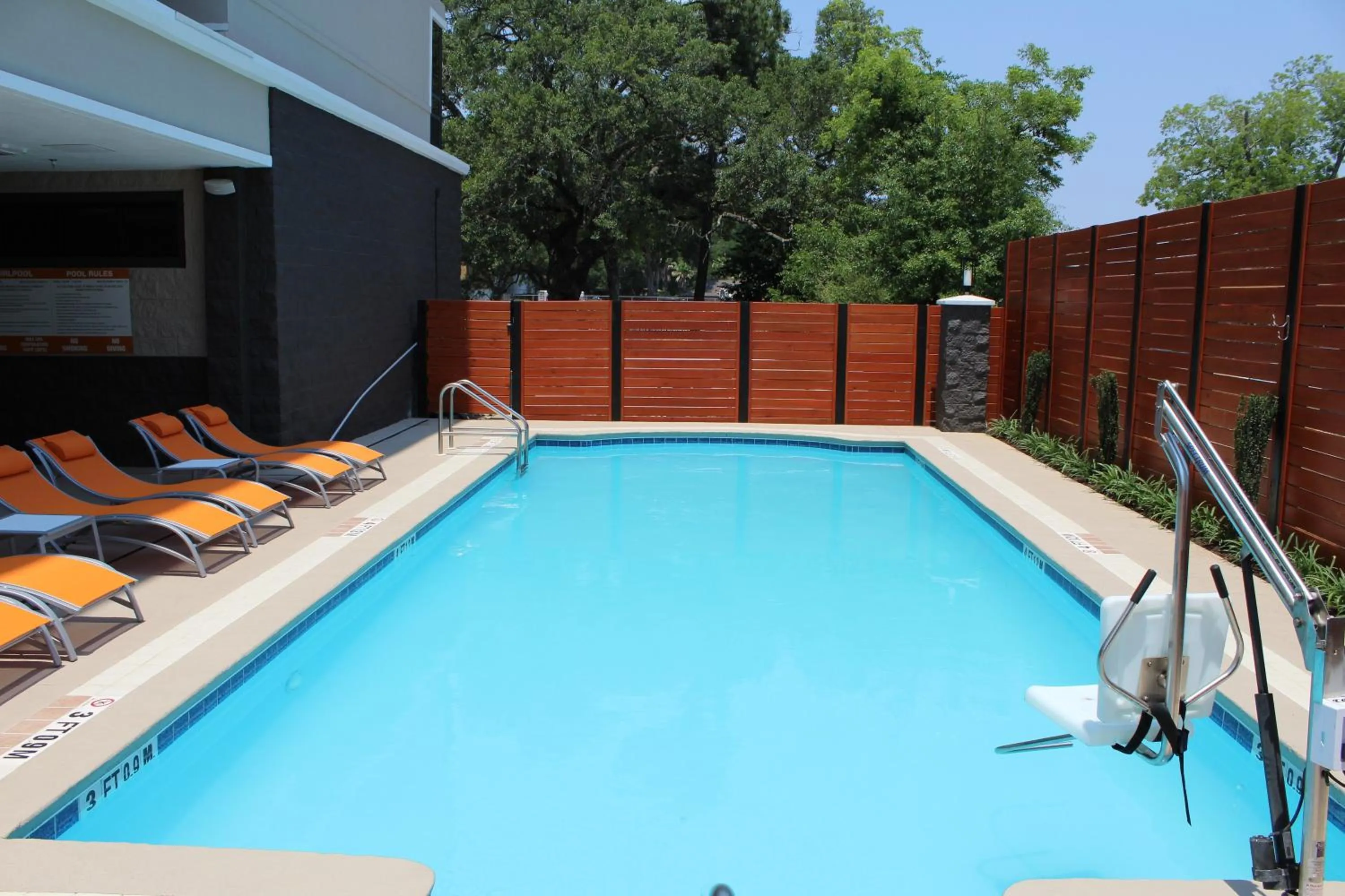 Swimming pool in Holiday Inn Pensacola - University Area by IHG