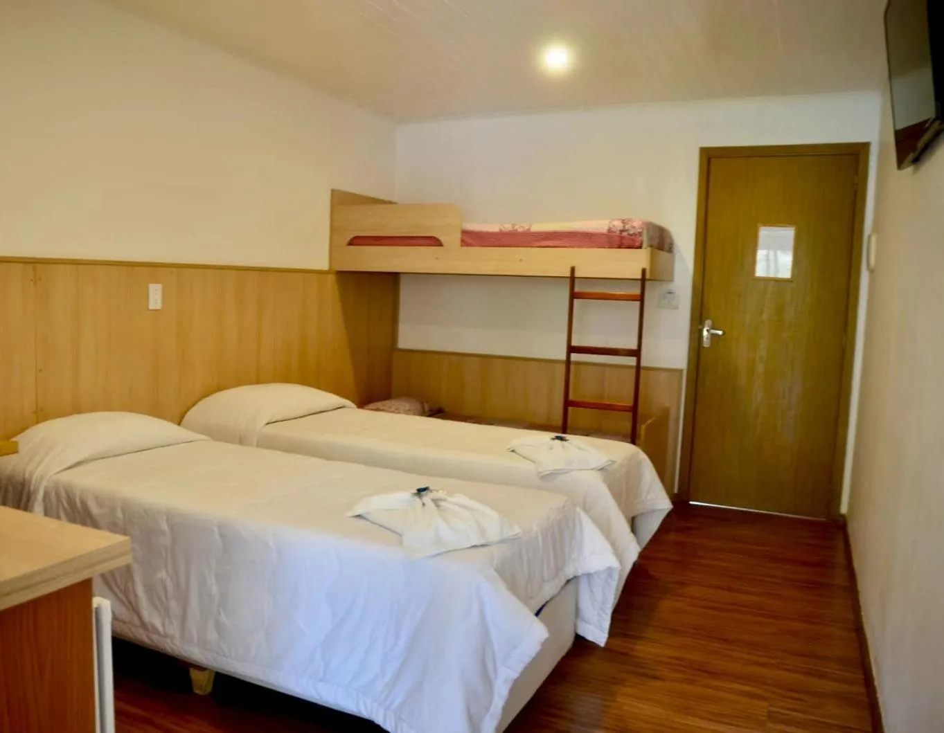 Bed in Pousada Primavera Campos do Jordao