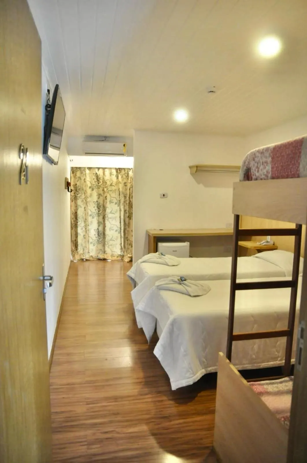 Bed in Pousada Primavera Campos do Jordao