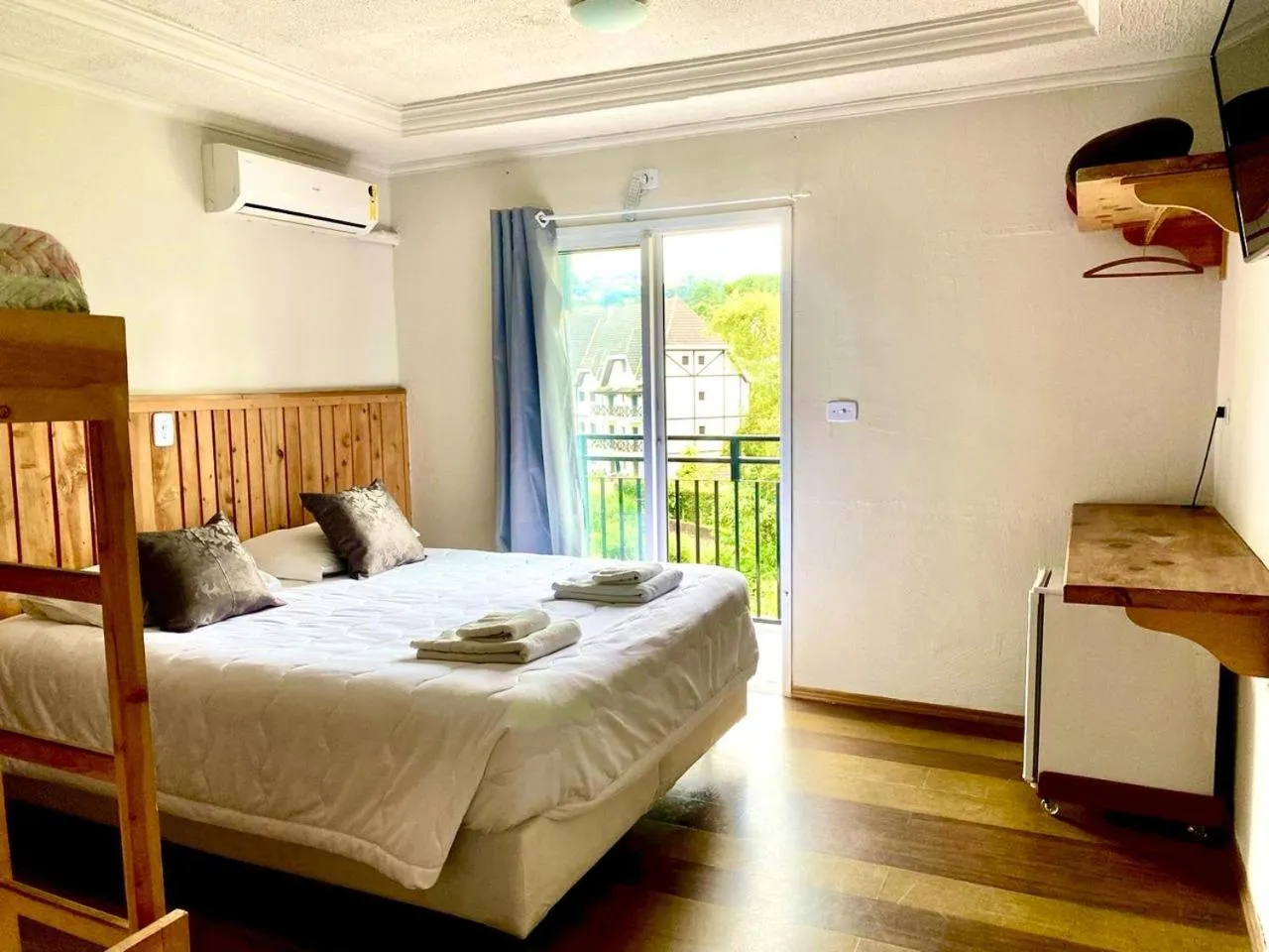 Bed in Pousada Primavera Campos do Jordao