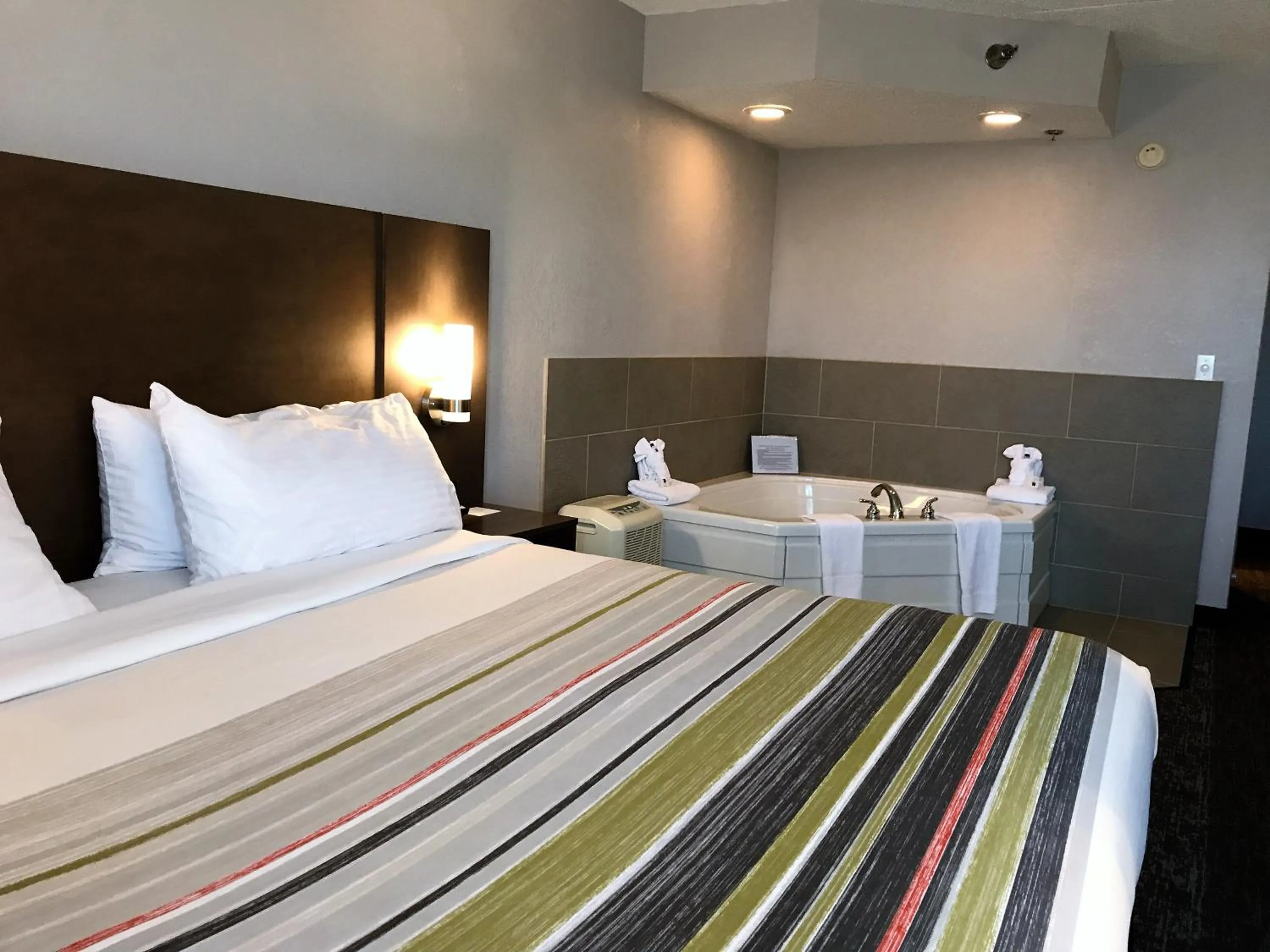 Bedroom, Bed in Country Inn & Suites by Radisson, Mt Pleasant-Racine West, WI