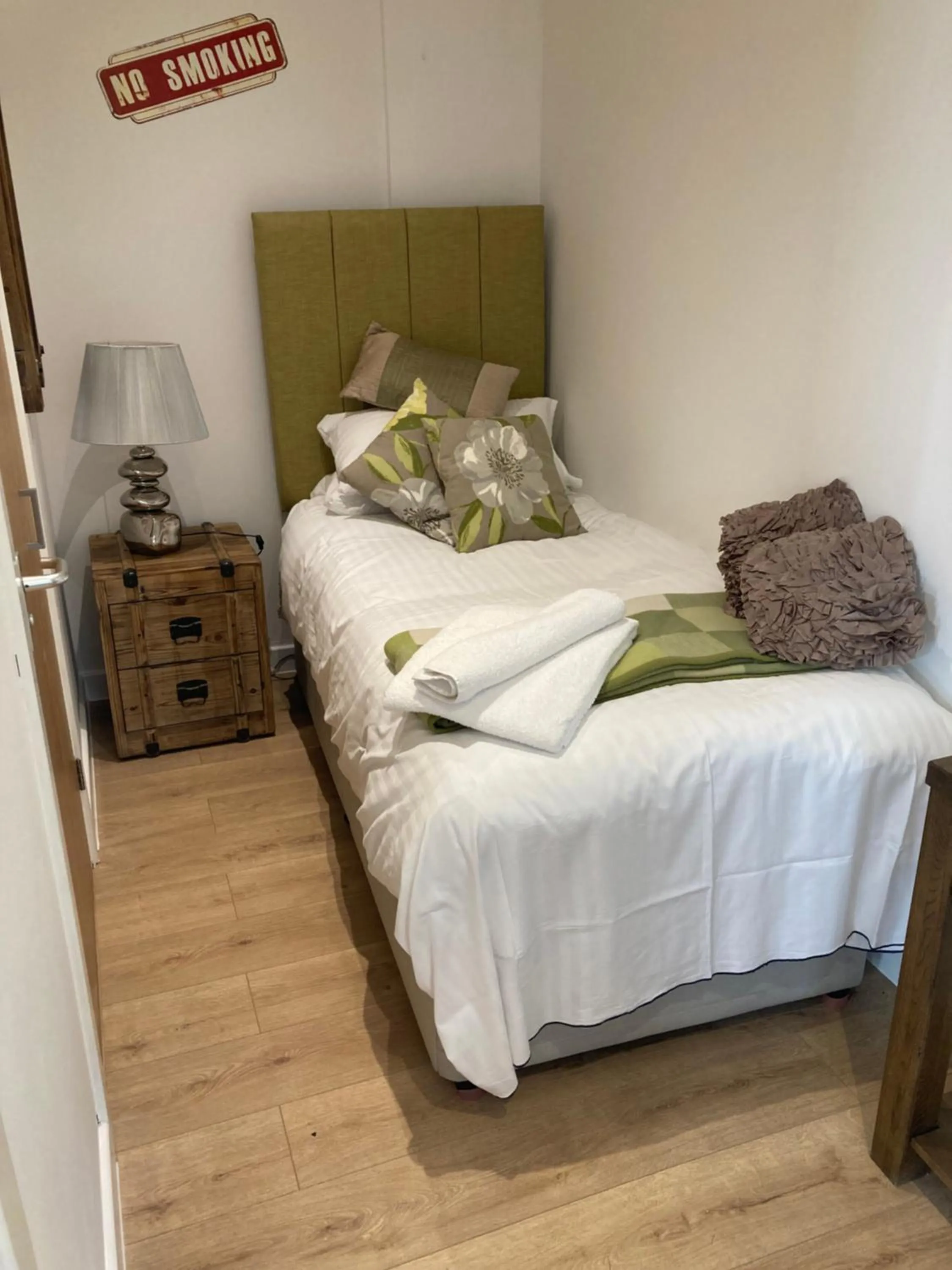 Bed in Linnaea House Rooms