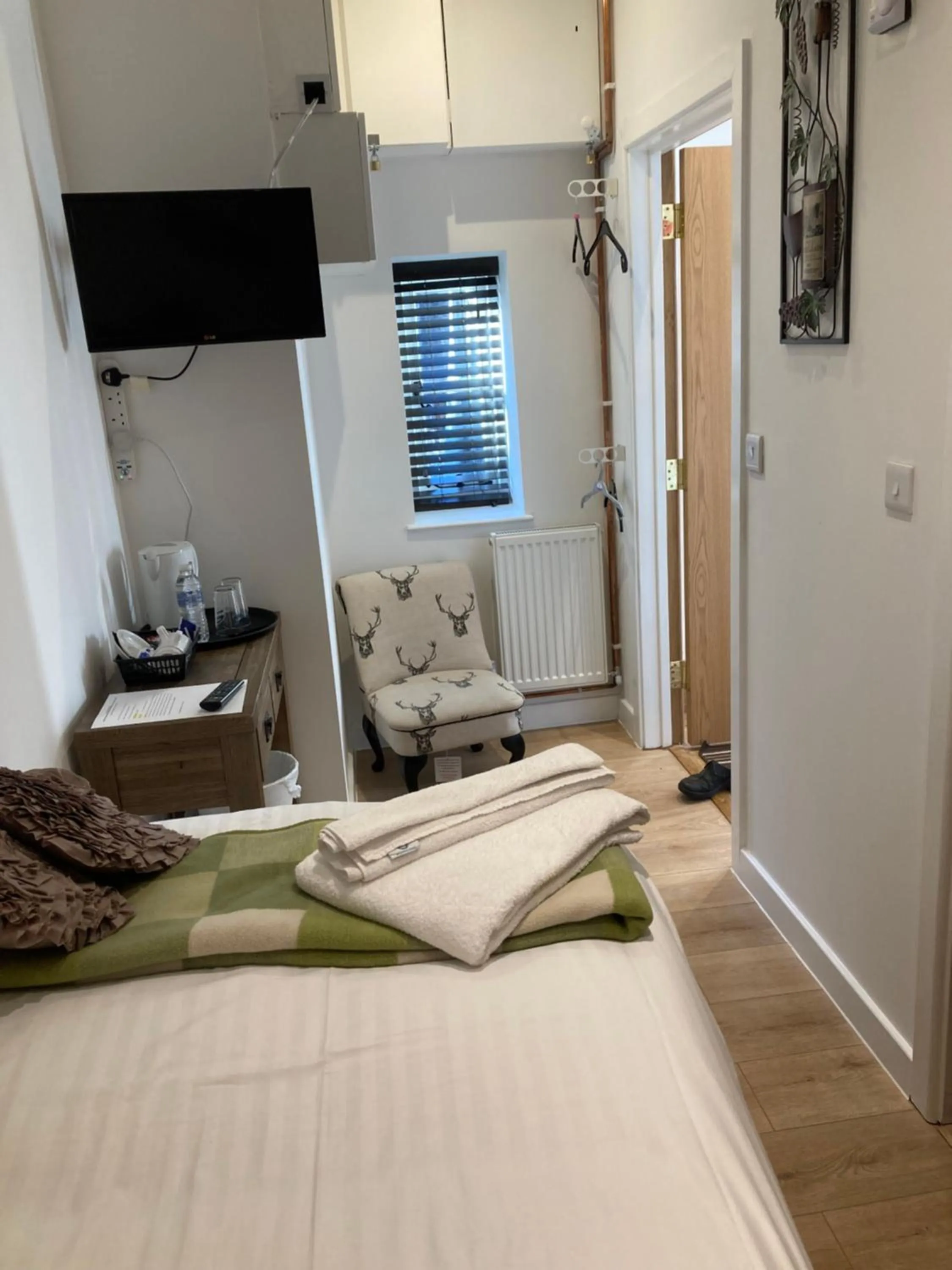 Bed in Linnaea House Rooms