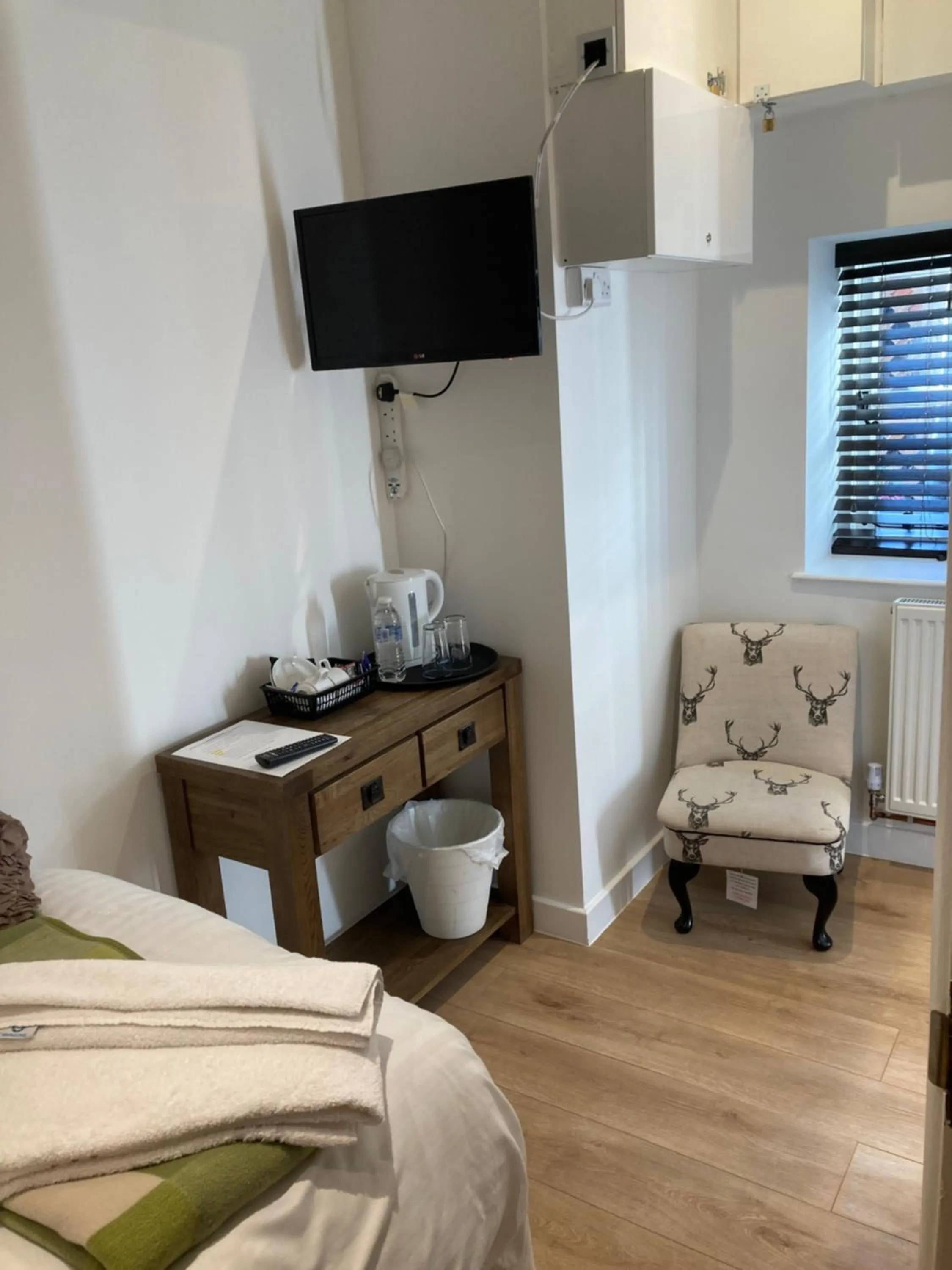 Bed in Linnaea House Rooms