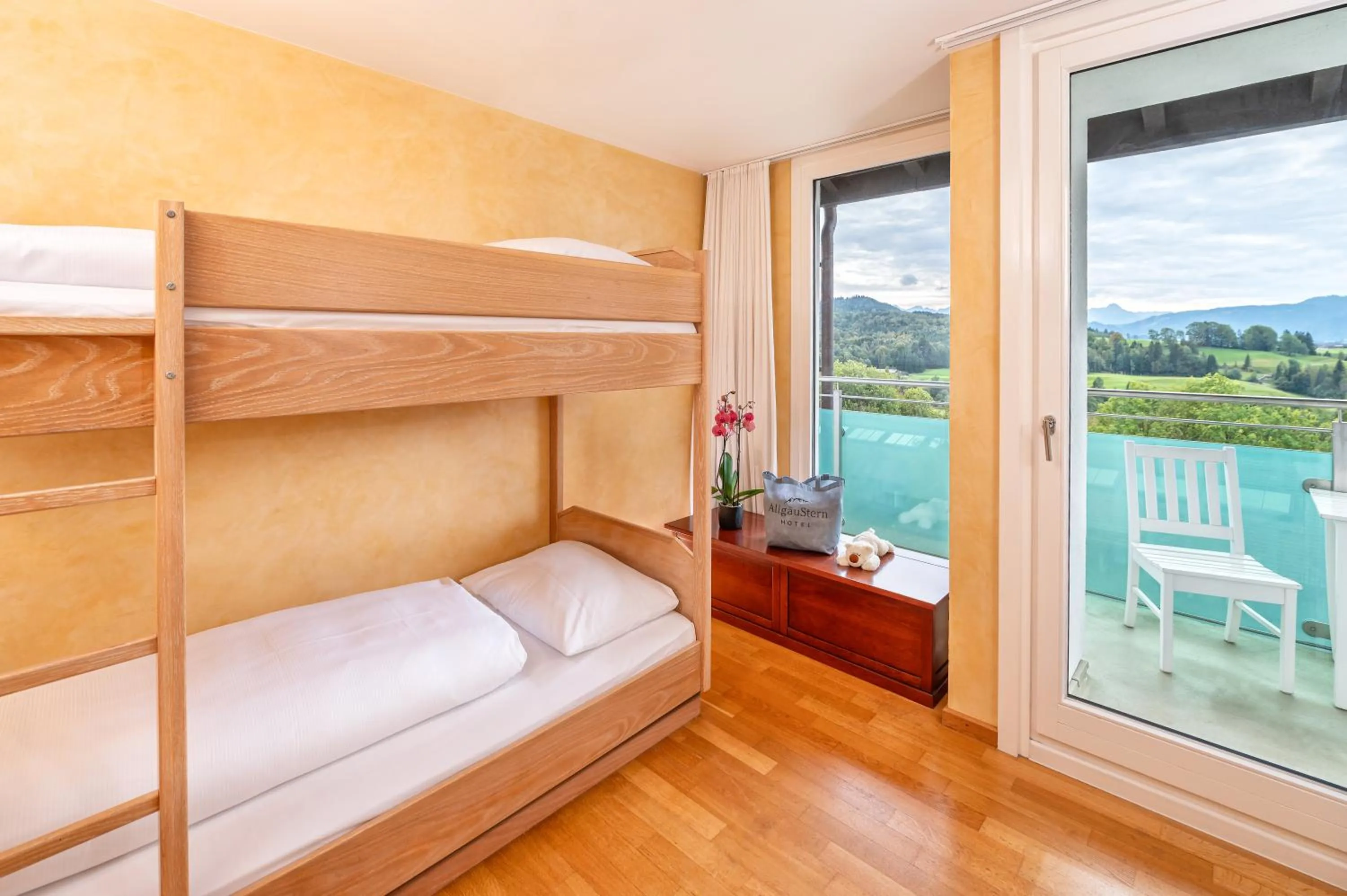 Photo of the whole room, Bed in AllgäuStern Hotel