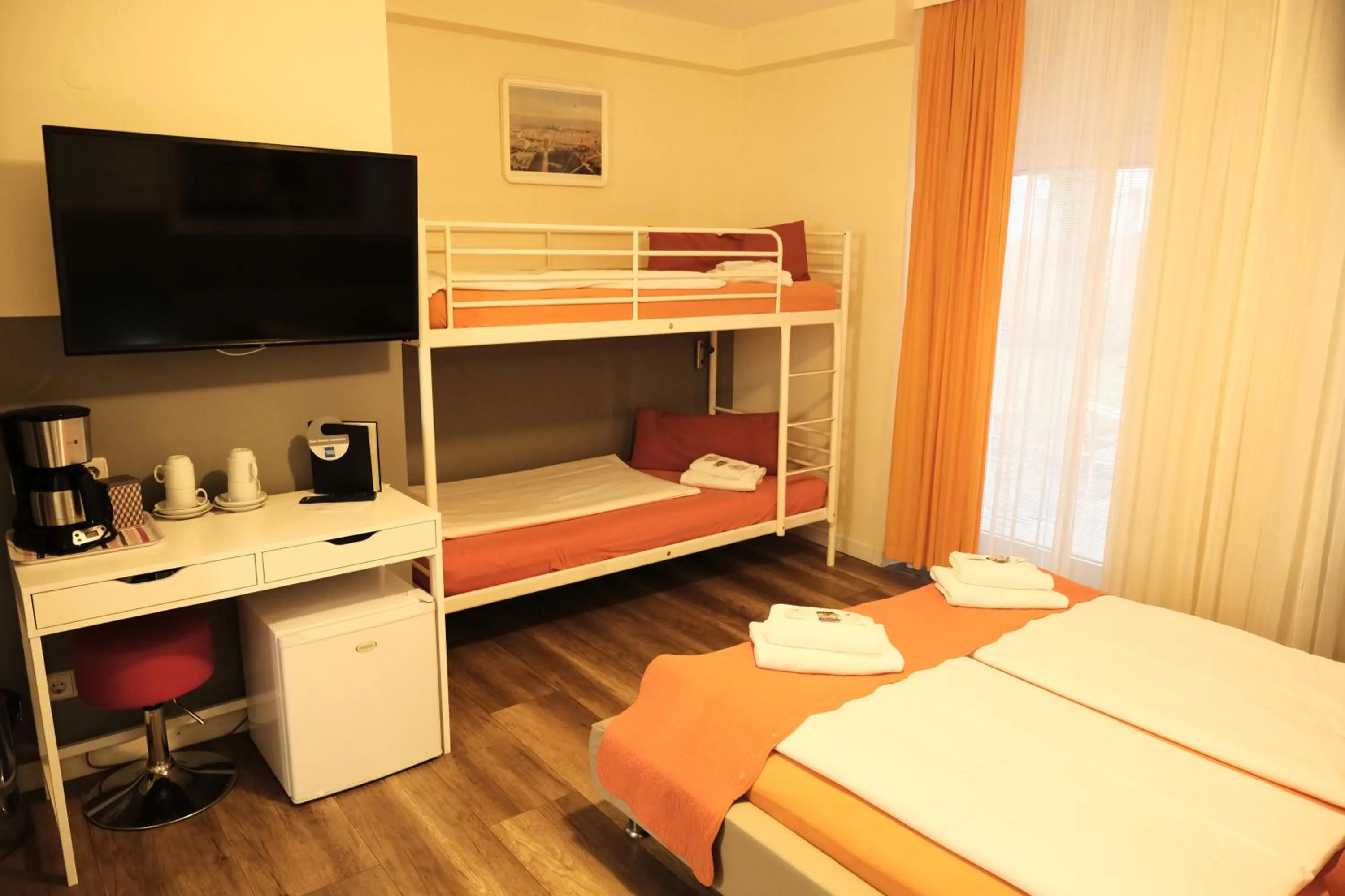 Bed in City Guesthouse Pension Berlin