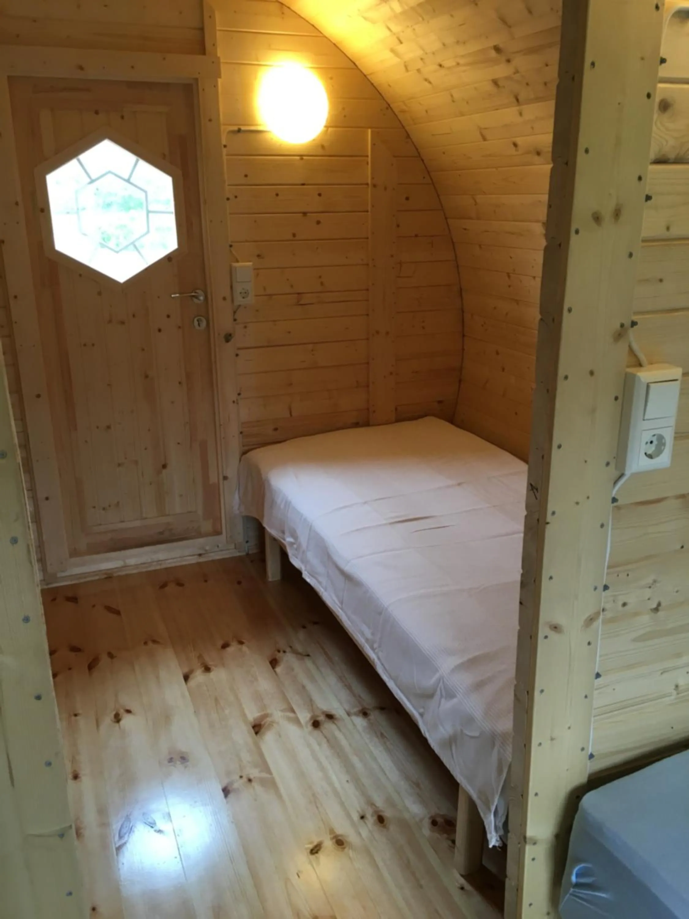 Property building, Bed in Framtid Camping Lodging Barrels