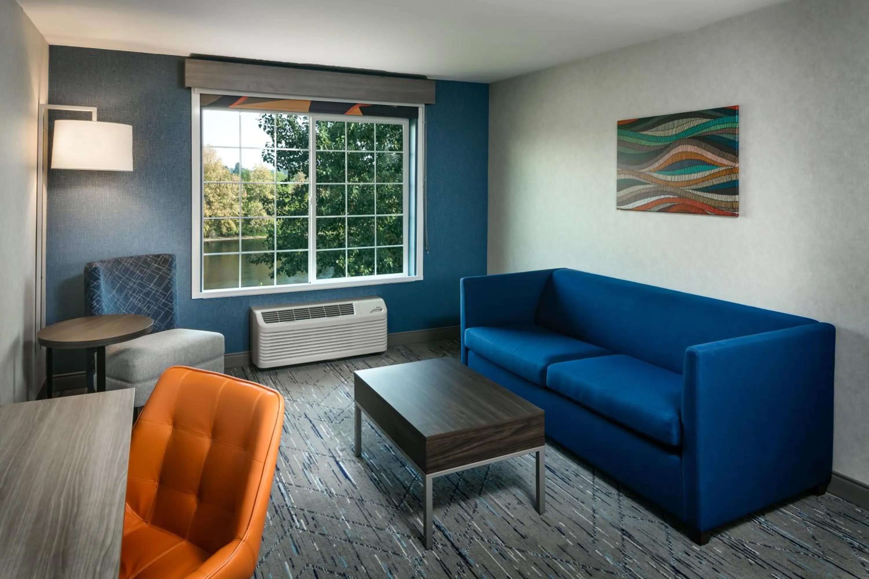 Seating area in Holiday Inn Express Corvallis-On the River by IHG