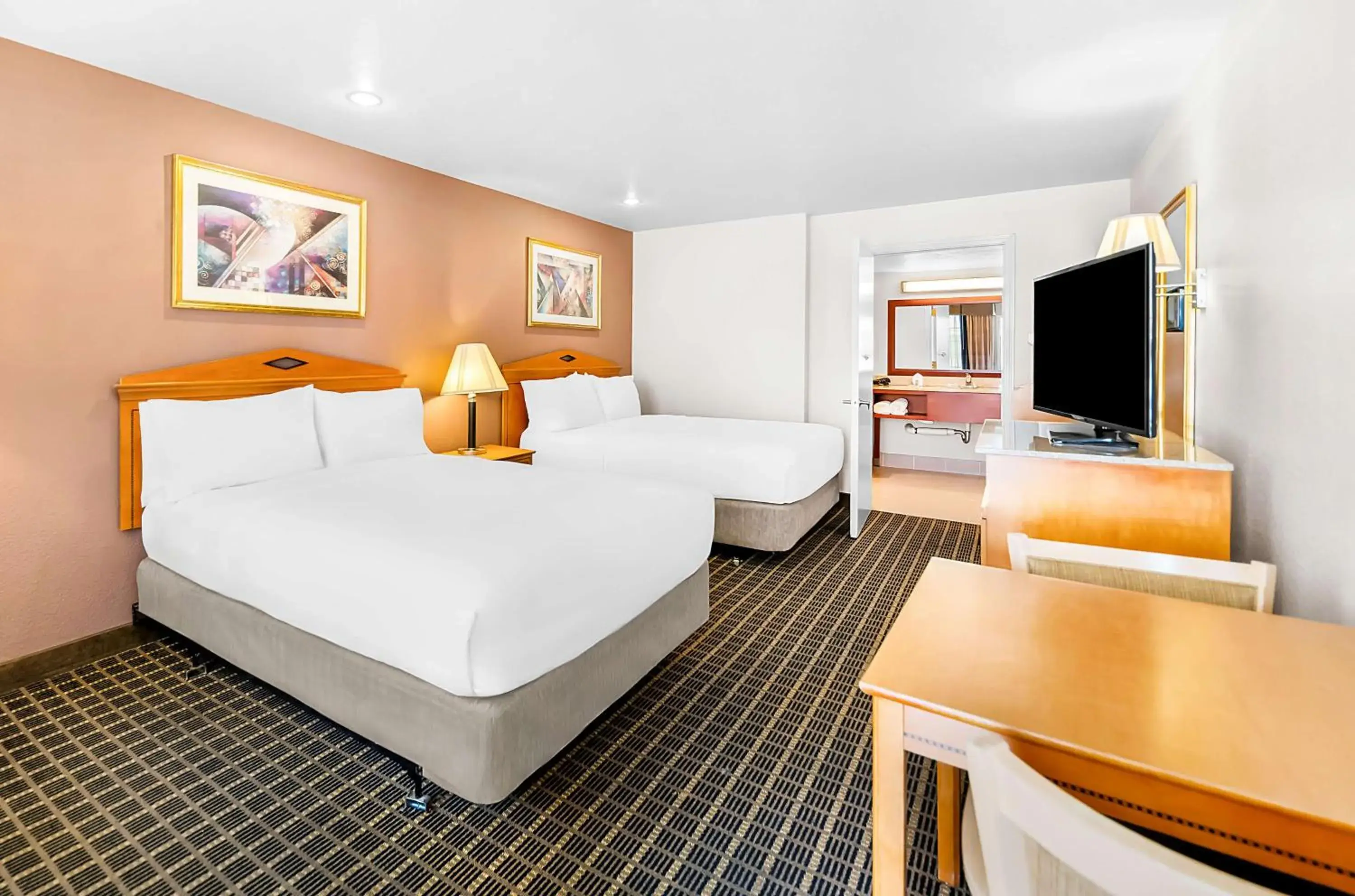 Double Room with Two Double Beds and Bath Tub - Disability Access in SureStayPlus Hotel by Best Western San Jose Central City Double Room with Two Double Beds and Bath Tub - Disability Access in SureStayPlus Hotel by Best Western San Jose Central City
