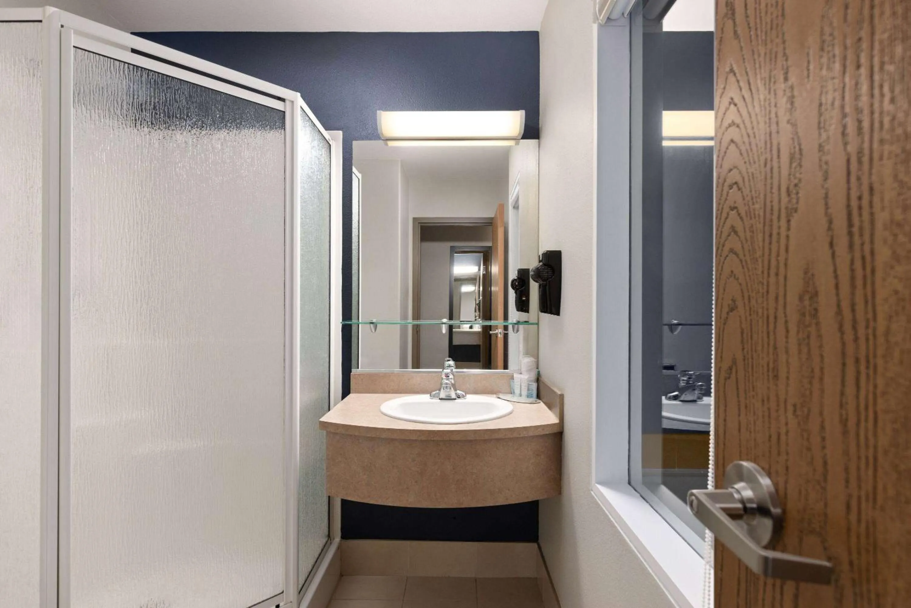 Bathroom in Super 8 by Wyndham St-Jerome