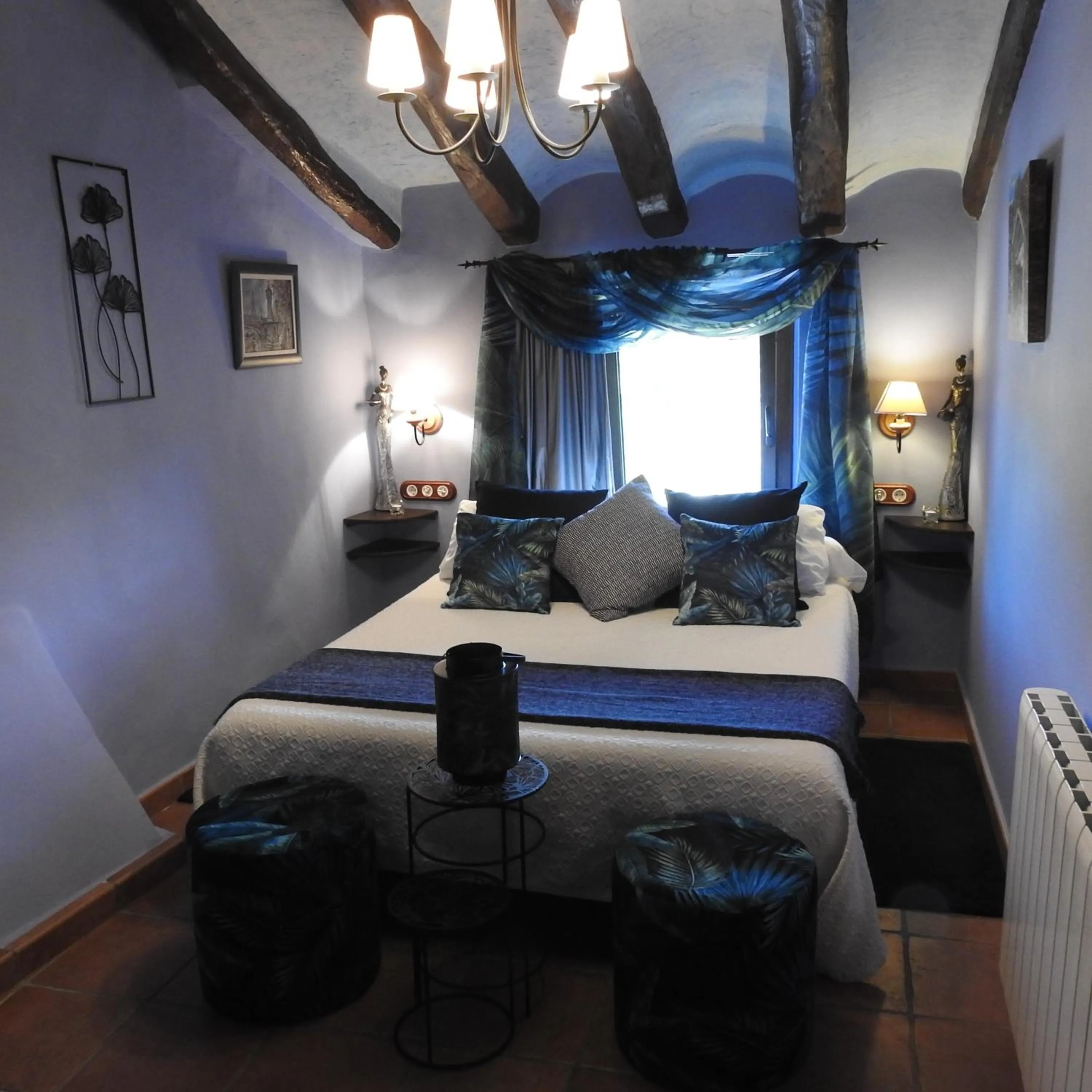 Bed in El Molí de Pontons suites con jacuzzi spa